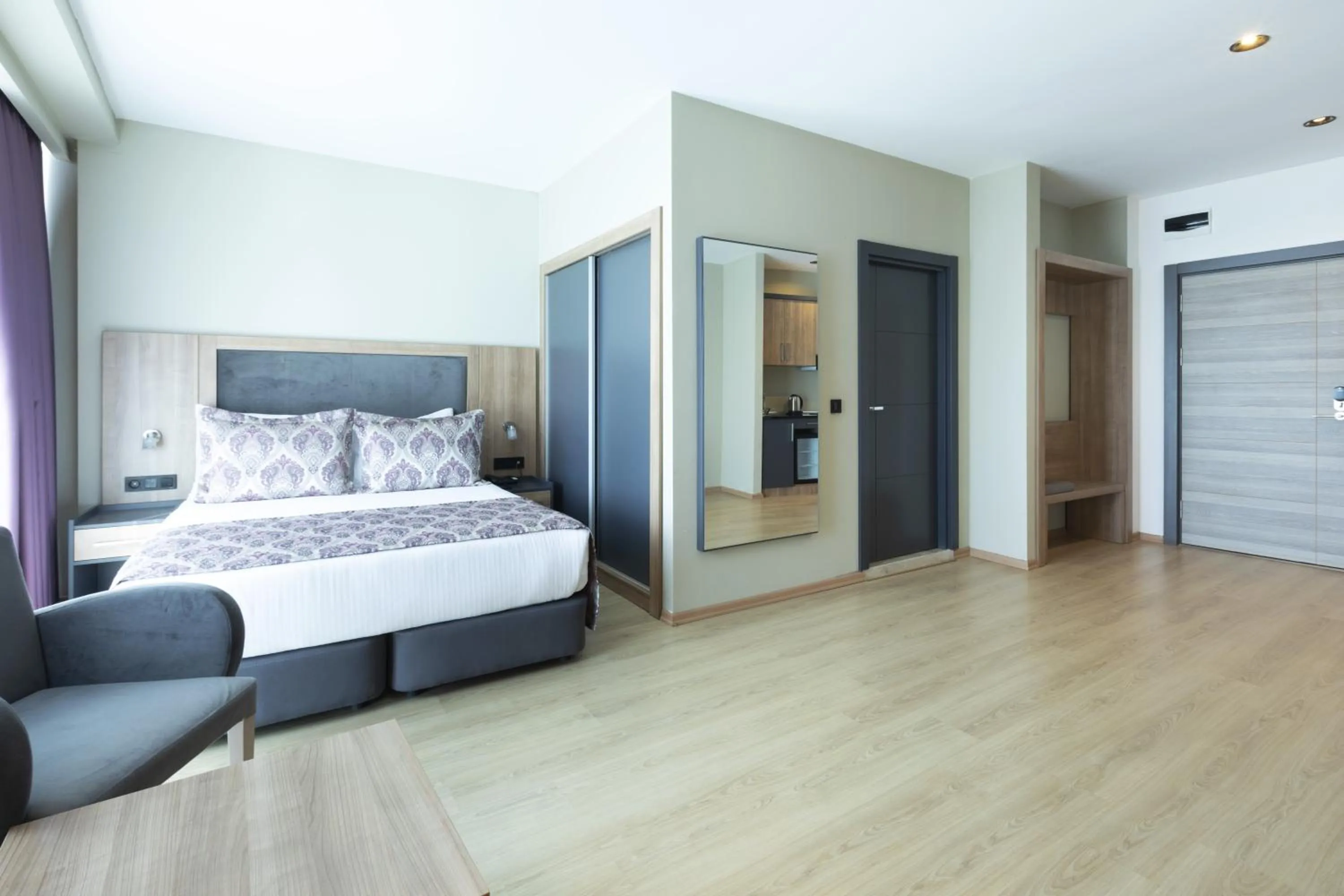 Photo of the whole room, Bed in Euphoria Apartments