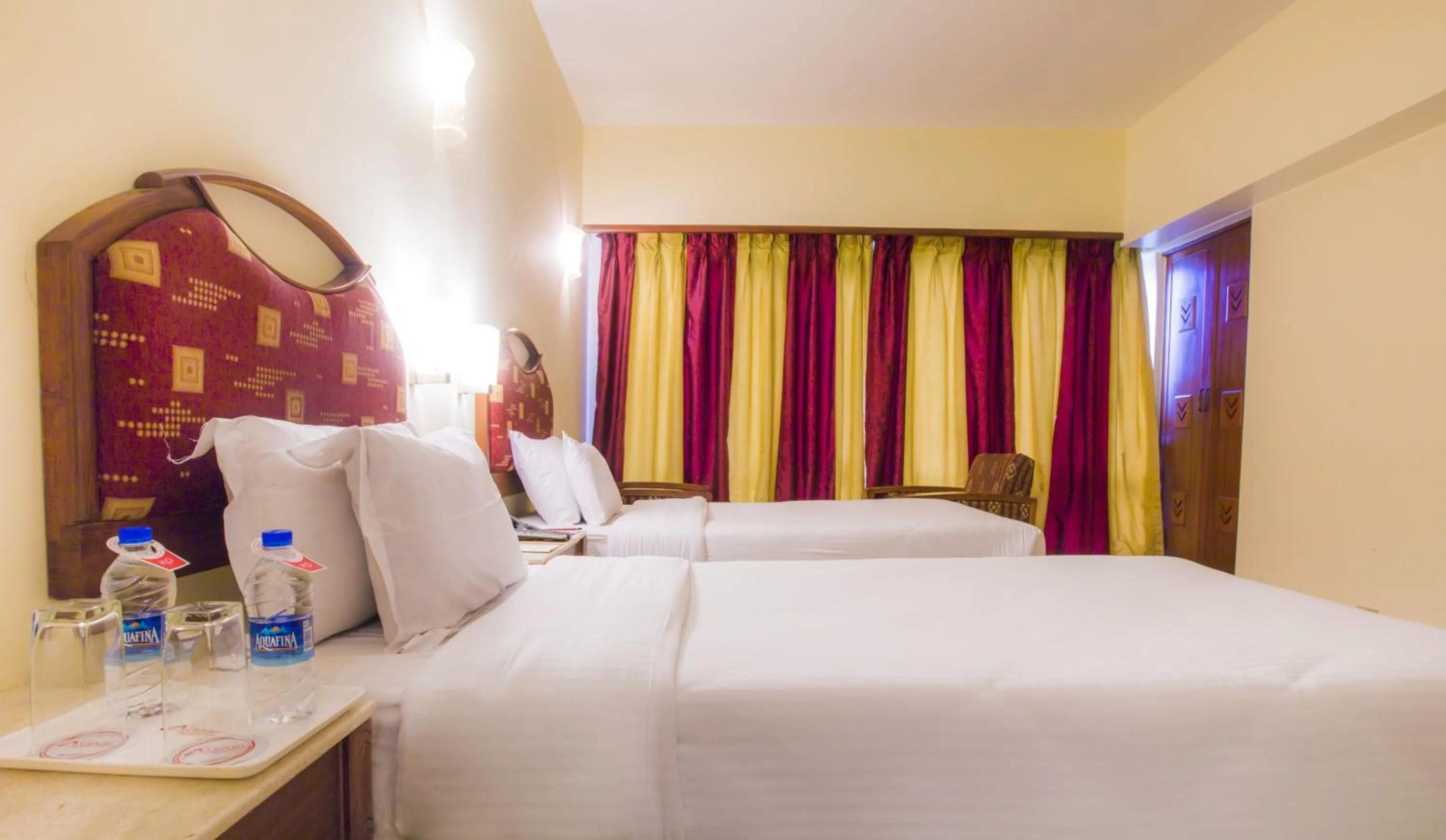 Living room, Bed in Hotel Airport International Mumbai