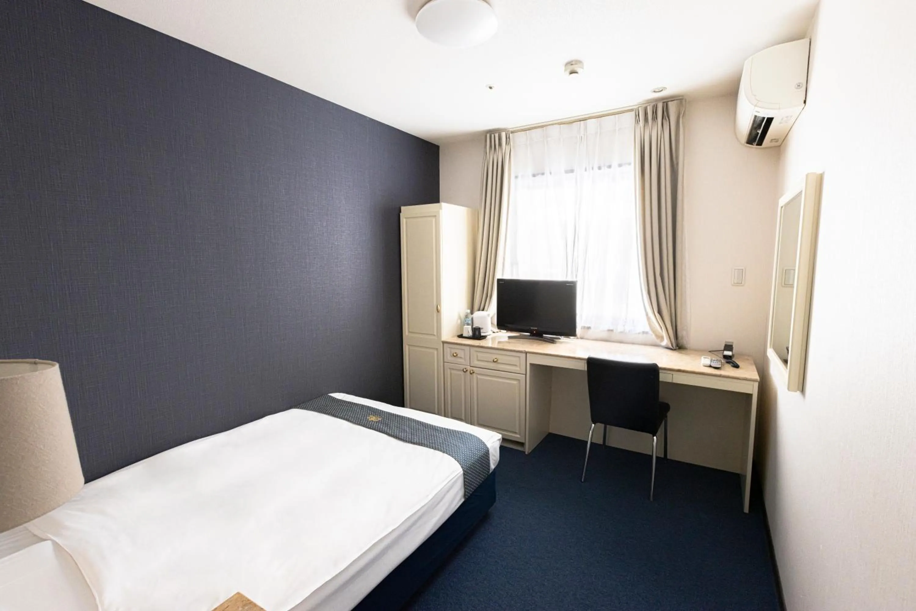 Bed in New Osaka Hotel Shinsaibashi