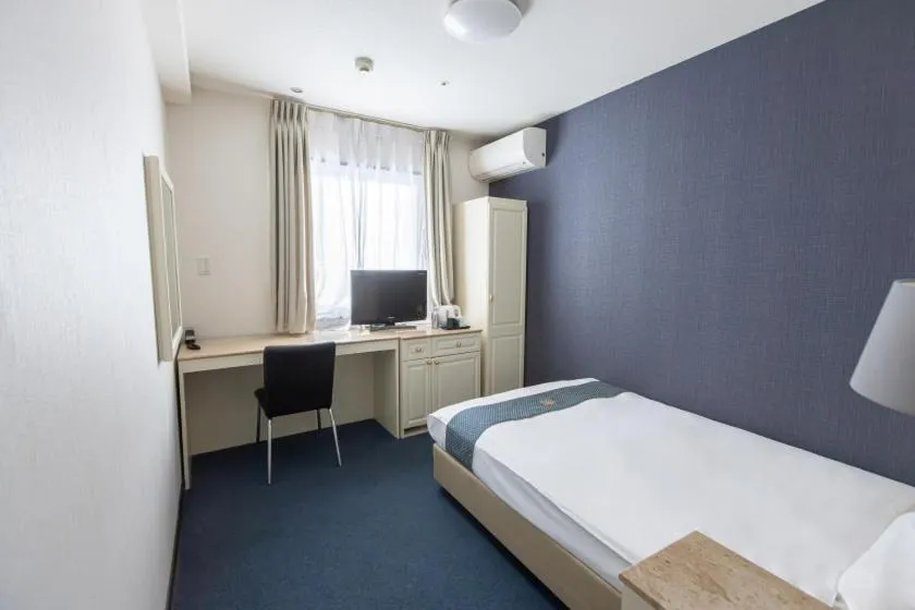 Bed in New Osaka Hotel Shinsaibashi