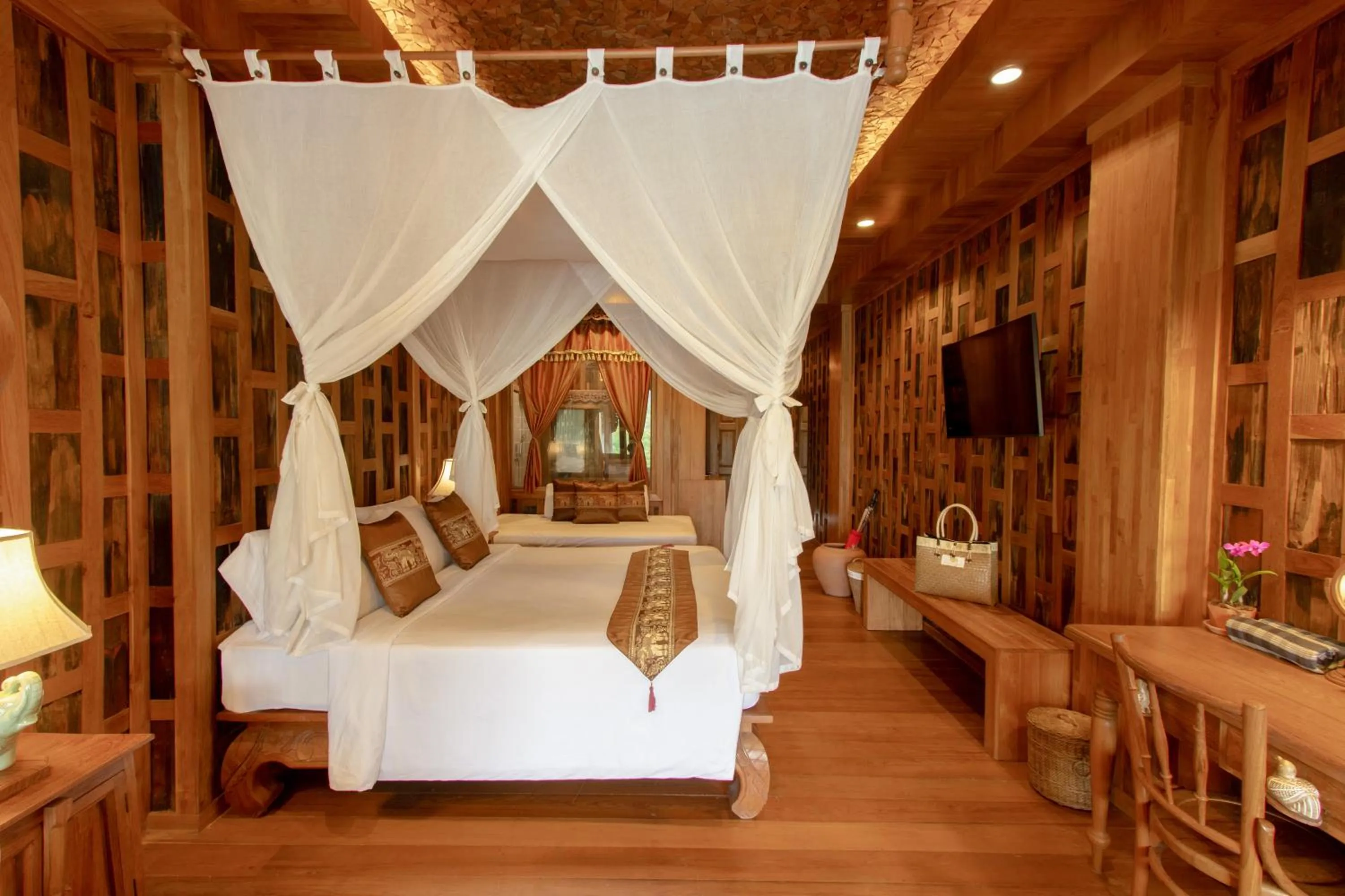 Property building, Bed in Santhiya Koh Chang Resort