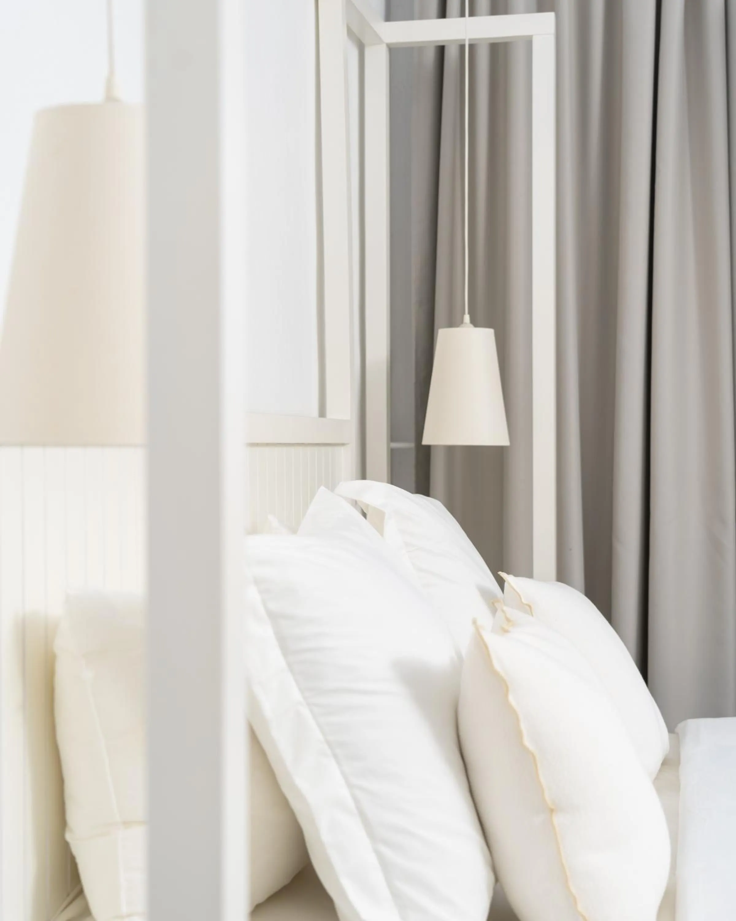 Bed in White Suites Resort- Adults Only Hotel