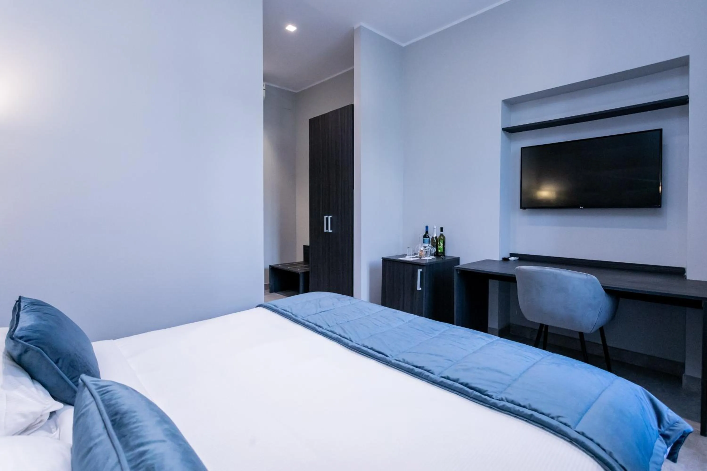 Bed in Cesare ai Cavalieri Suites