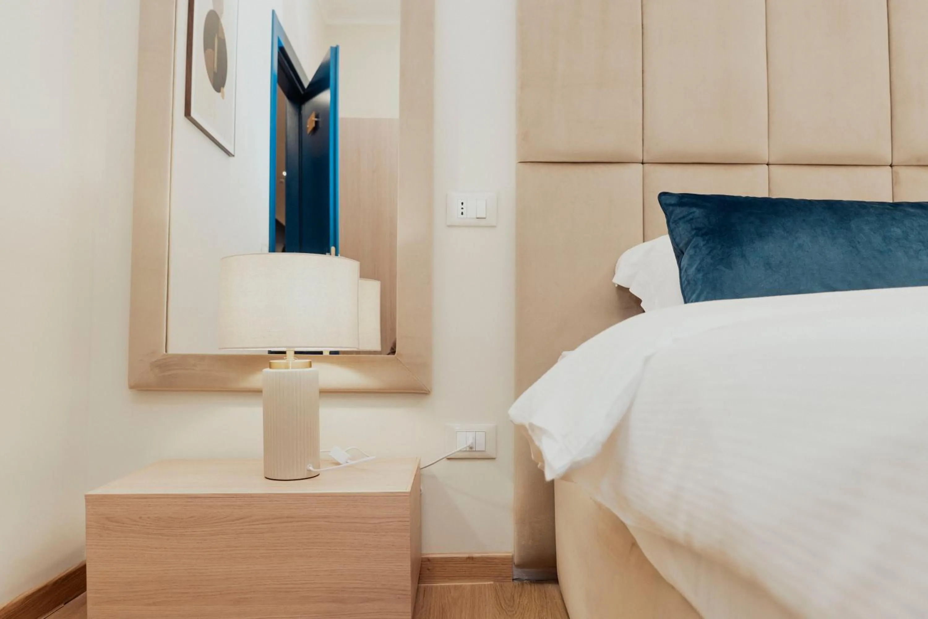 Bed in Cesare ai Cavalieri Suites