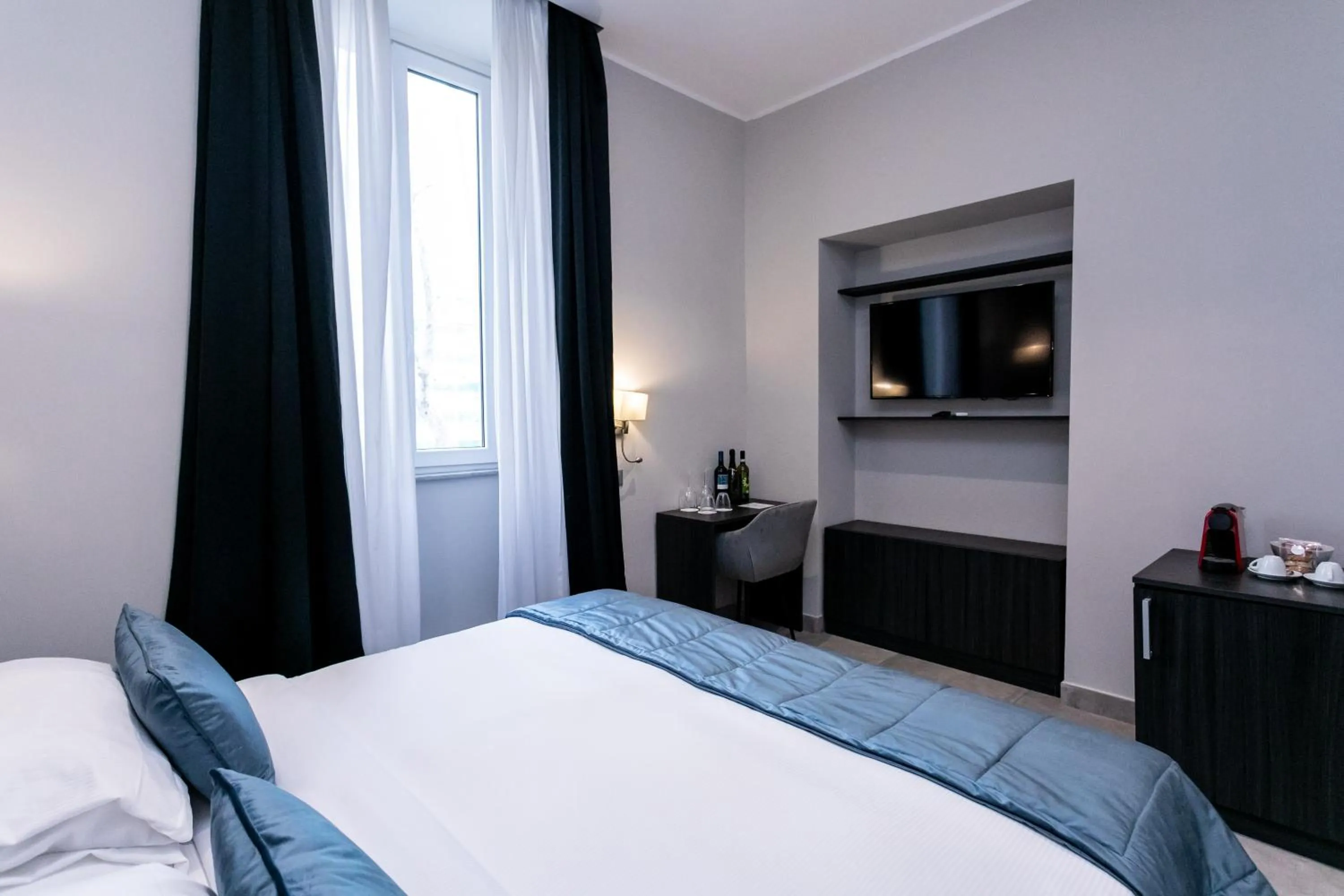 Bed in Cesare ai Cavalieri Suites