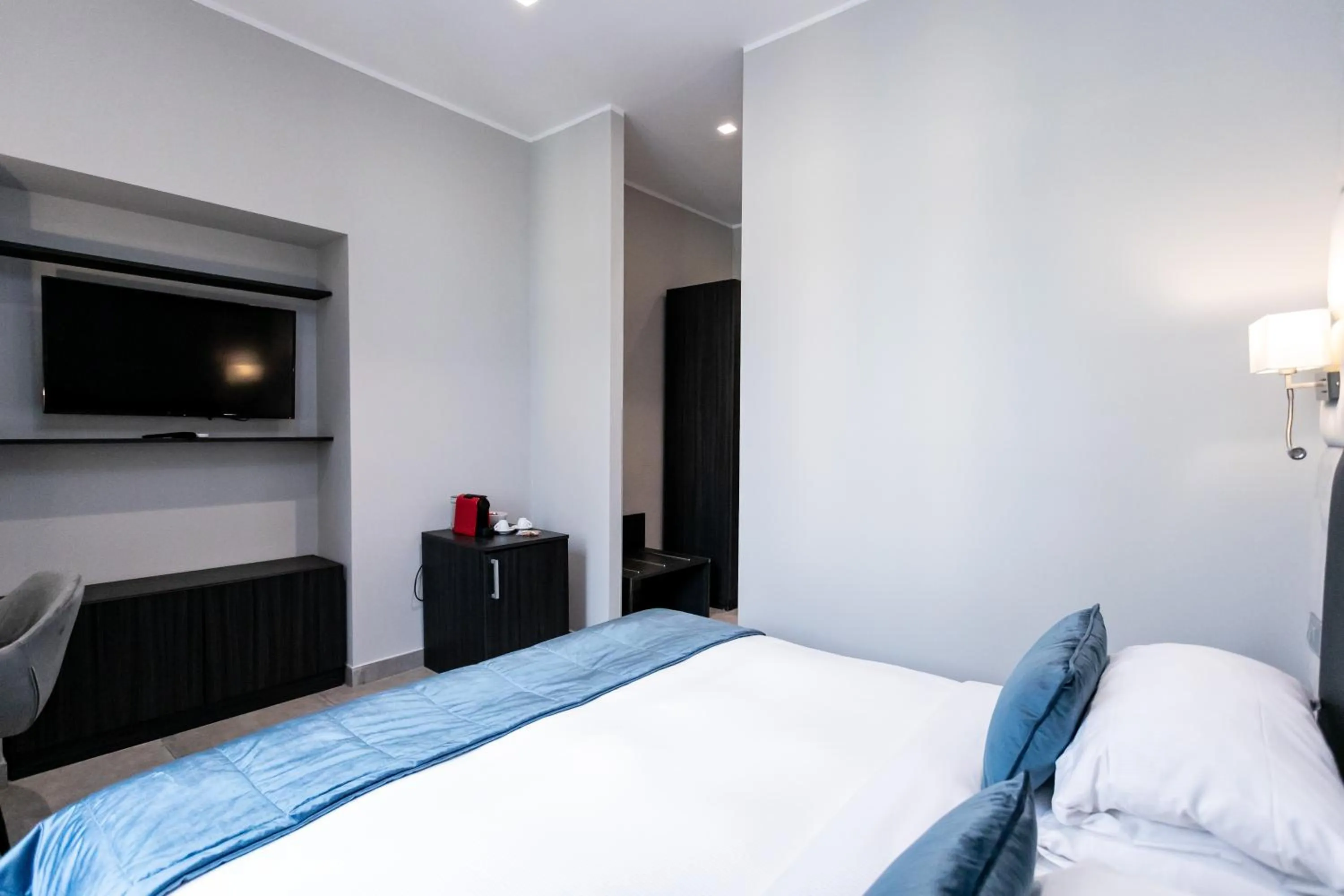 Bed in Cesare ai Cavalieri Suites