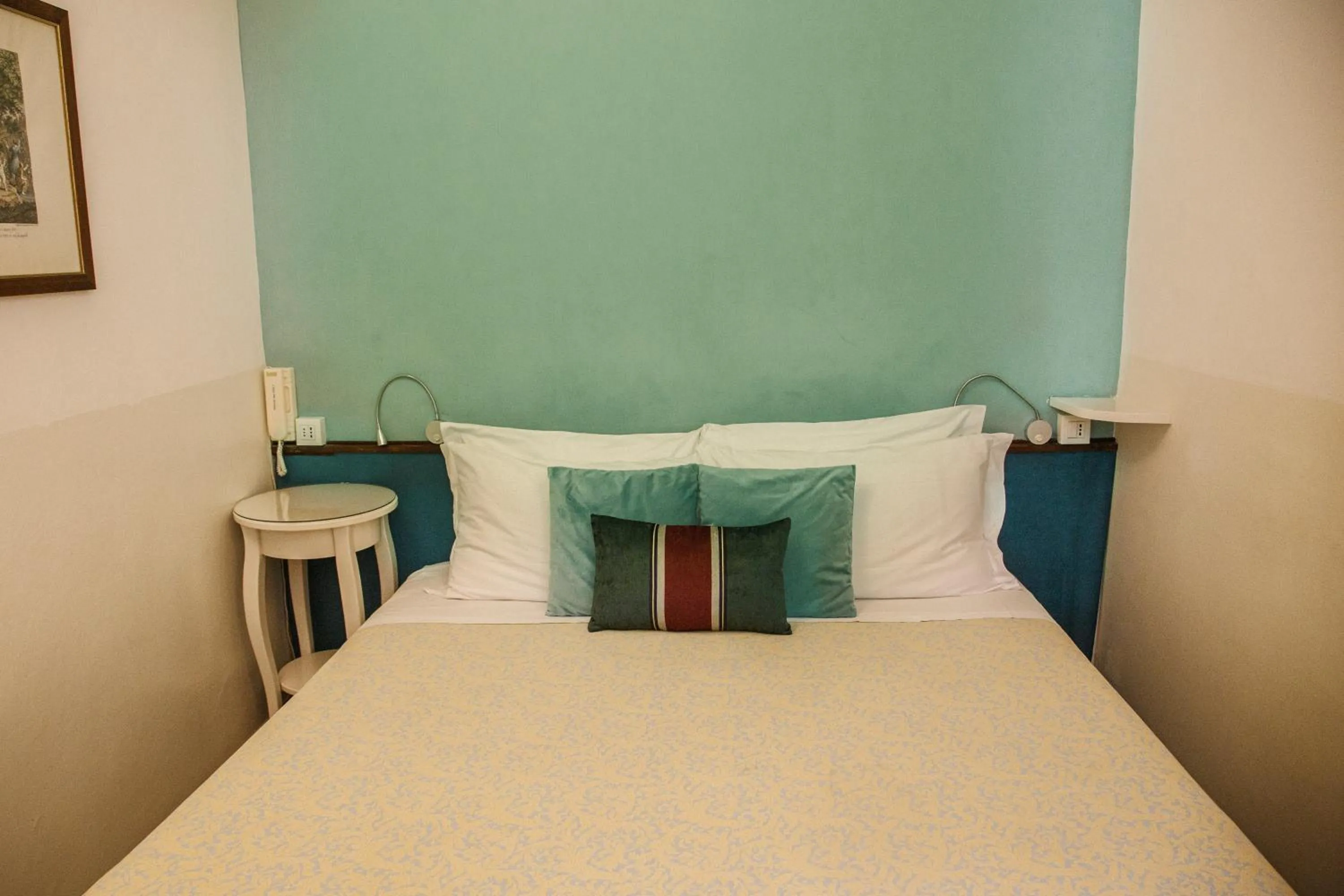 Bed in Hotel Casa Petrarca