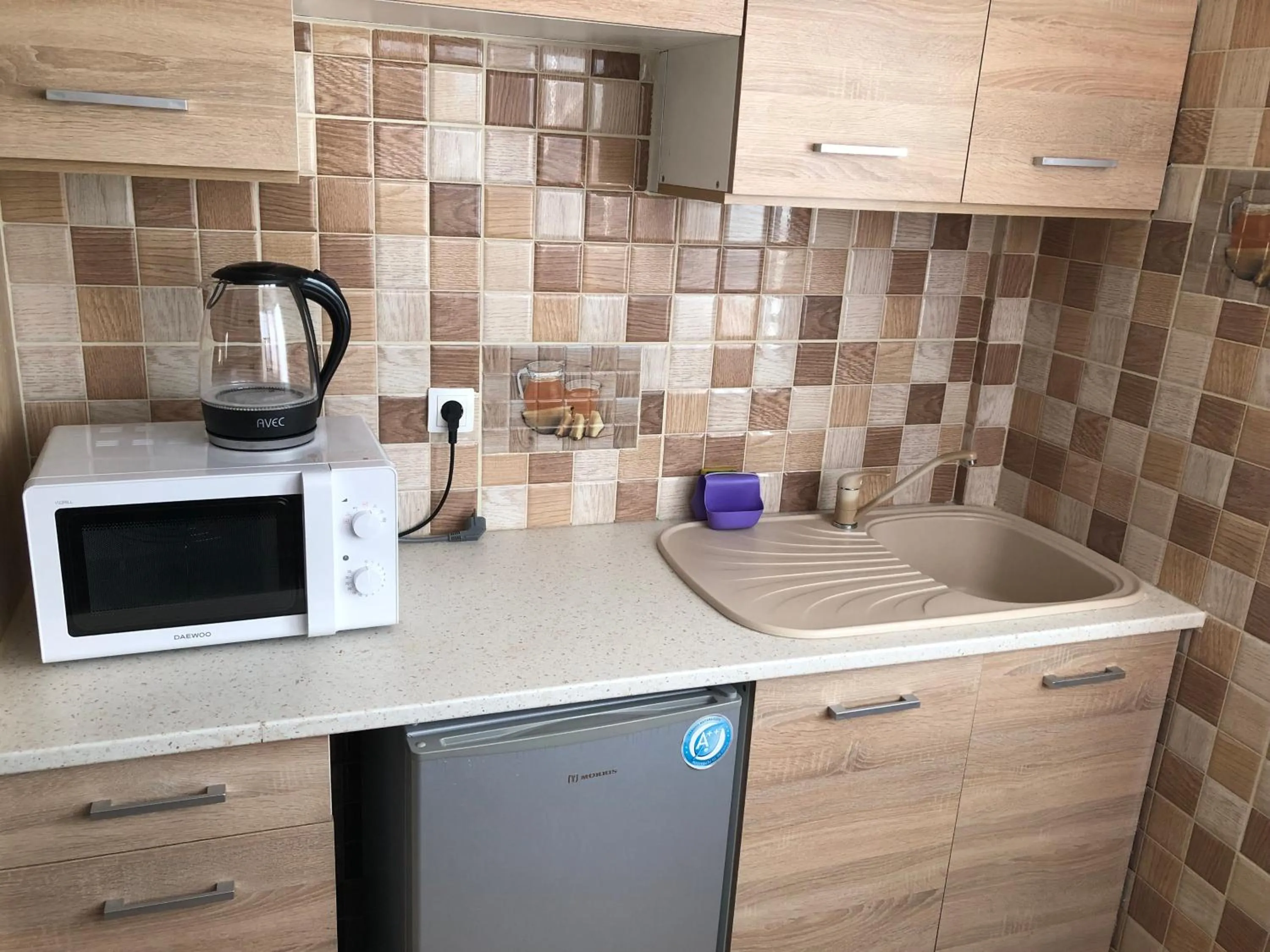 Kitchen or kitchenette in Nikolakakis Rooms Lavrio