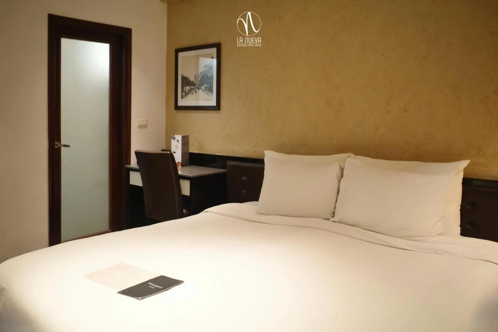 Bed in La Nueva Boutique Hotel Hanoi & Spa