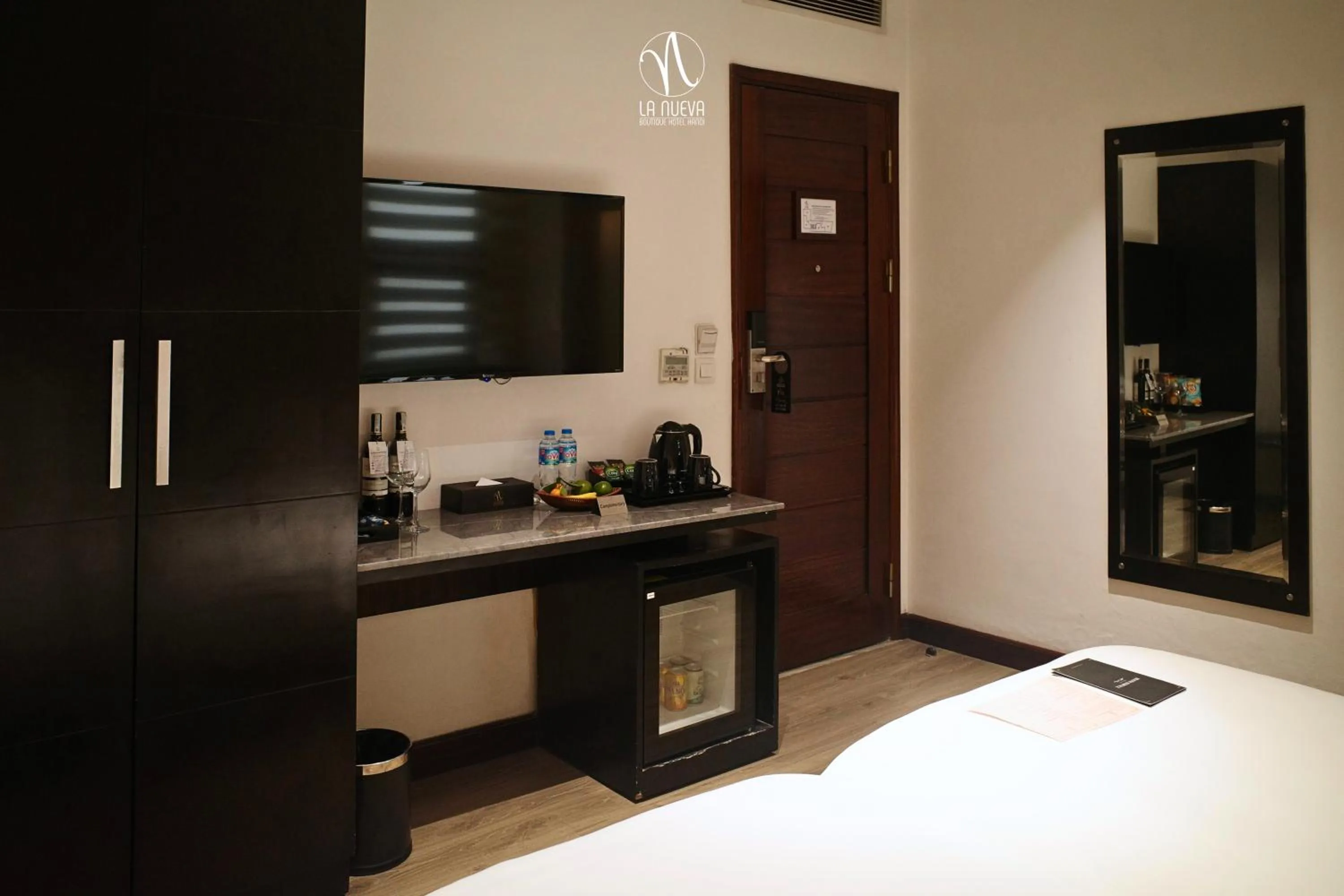 Photo of the whole room, Bed in La Nueva Boutique Hotel Hanoi & Spa