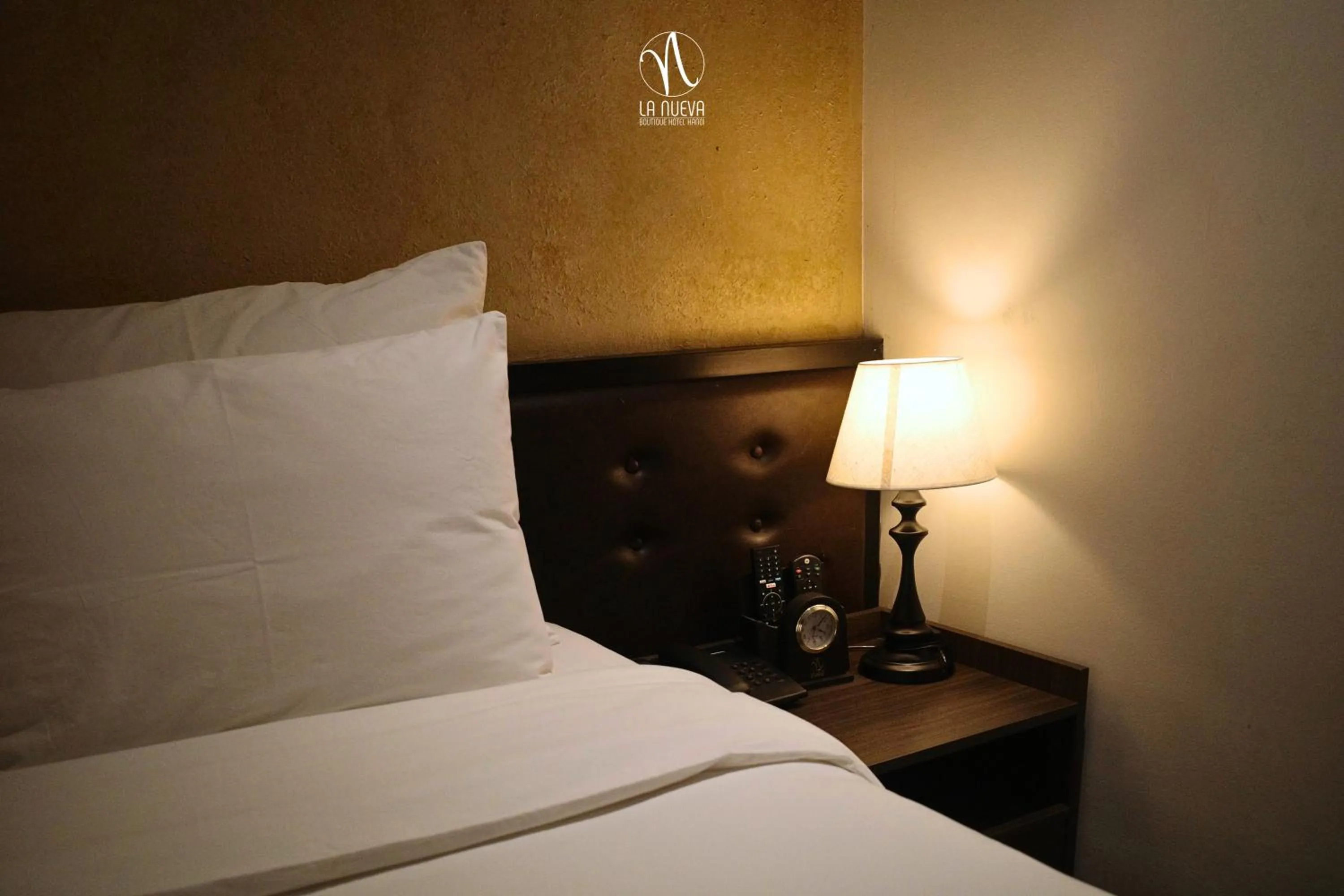 Bed in La Nueva Boutique Hotel Hanoi & Spa