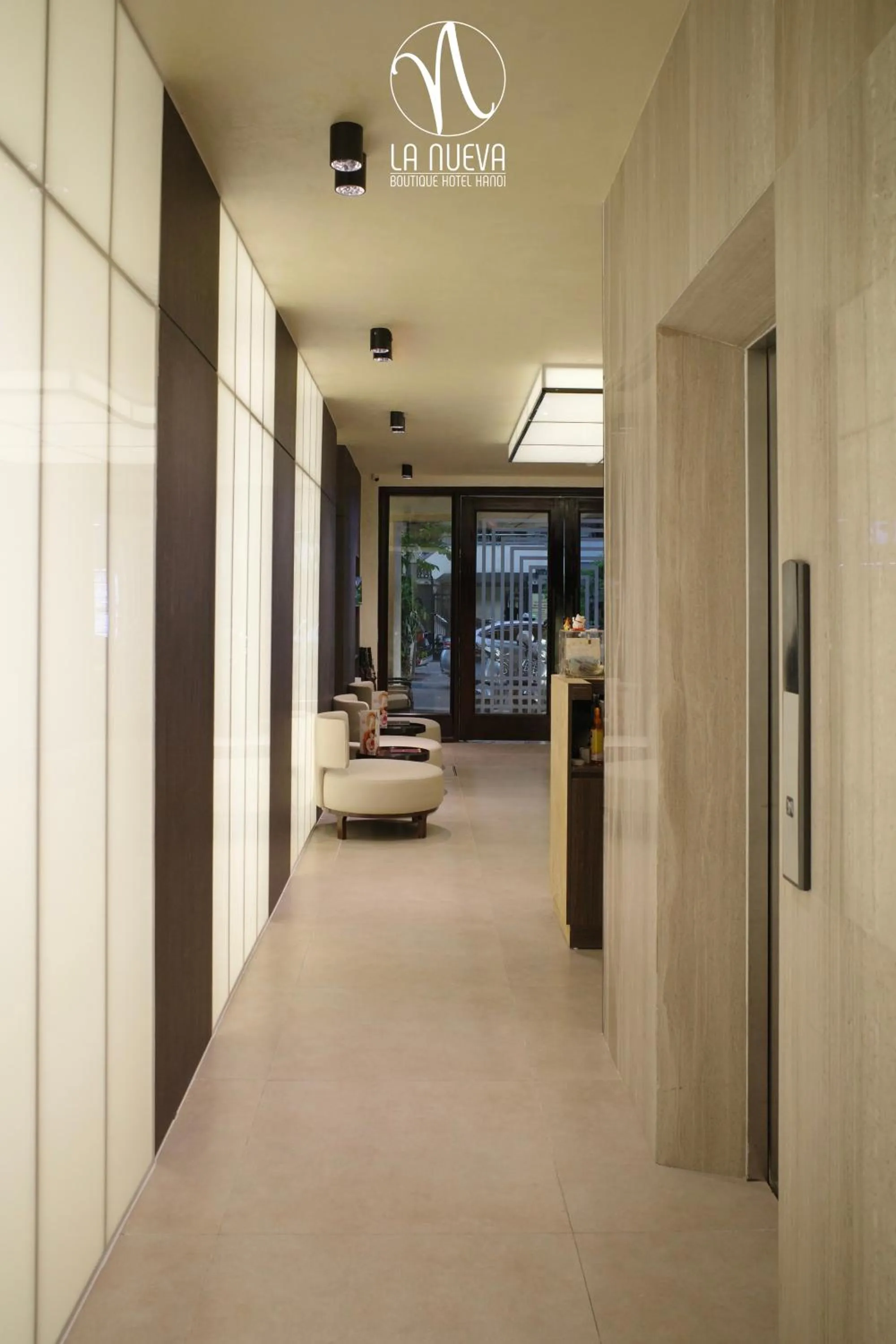 Communal lounge/ TV room, Bed in La Nueva Boutique Hotel Hanoi & Spa