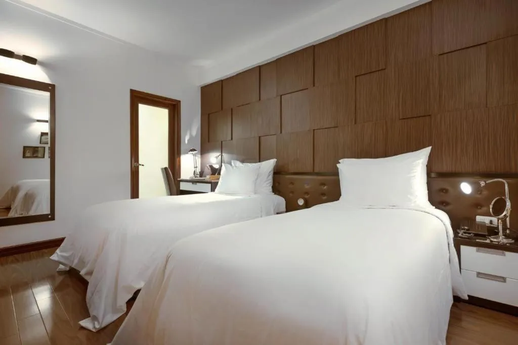 Bed in La Nueva Boutique Hotel Hanoi & Spa