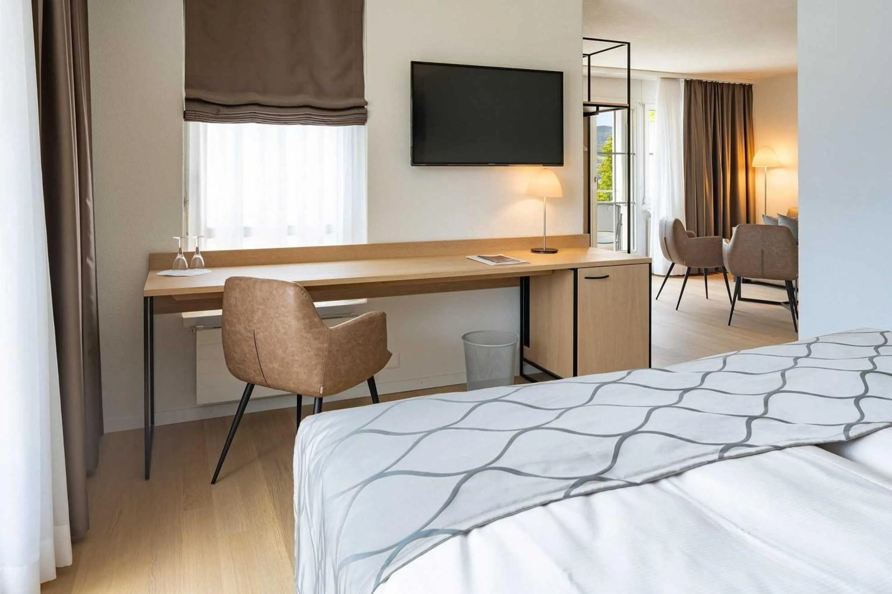 Photo of the whole room, Bed in Seehotel Winkelried