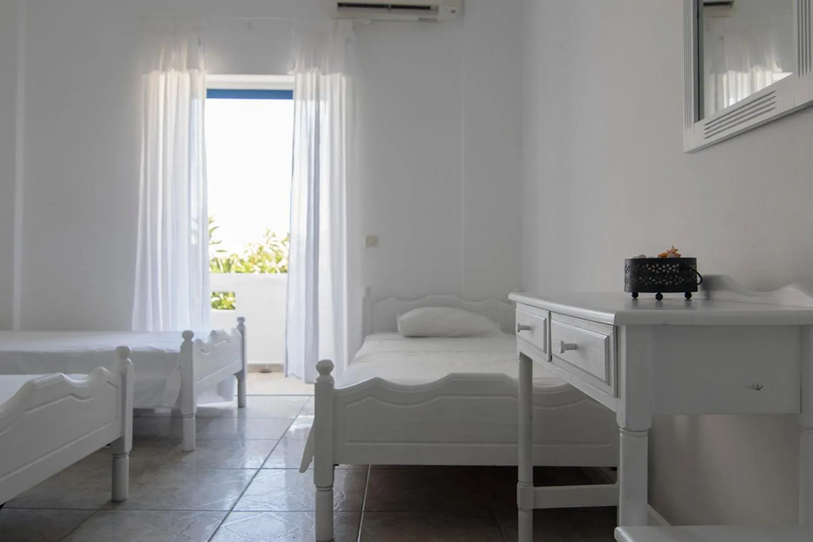 Photo of the whole room, Bed in Armadoros Hotel / Ios Backpackers