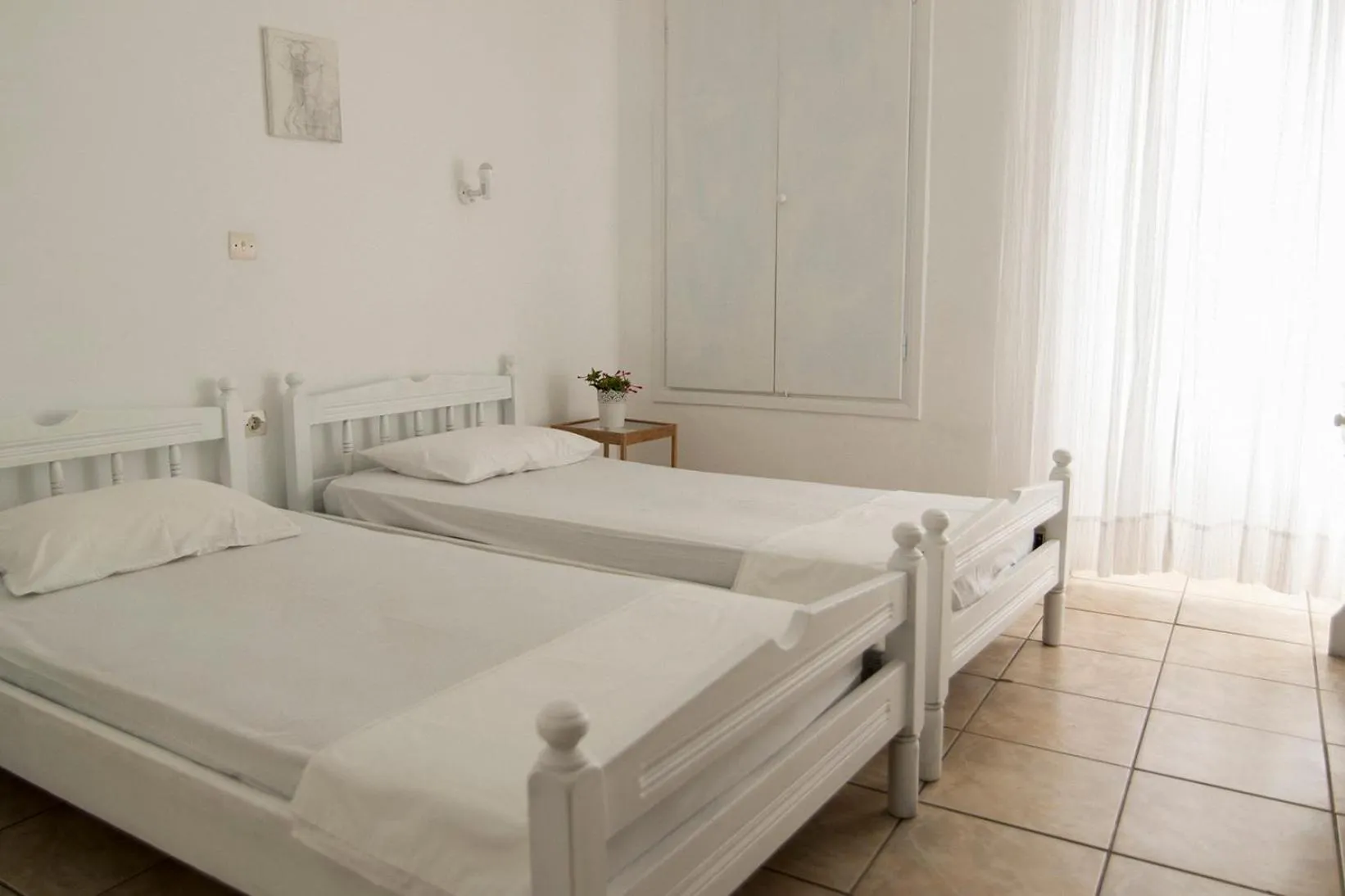 Photo of the whole room, Bed in Armadoros Hotel / Ios Backpackers