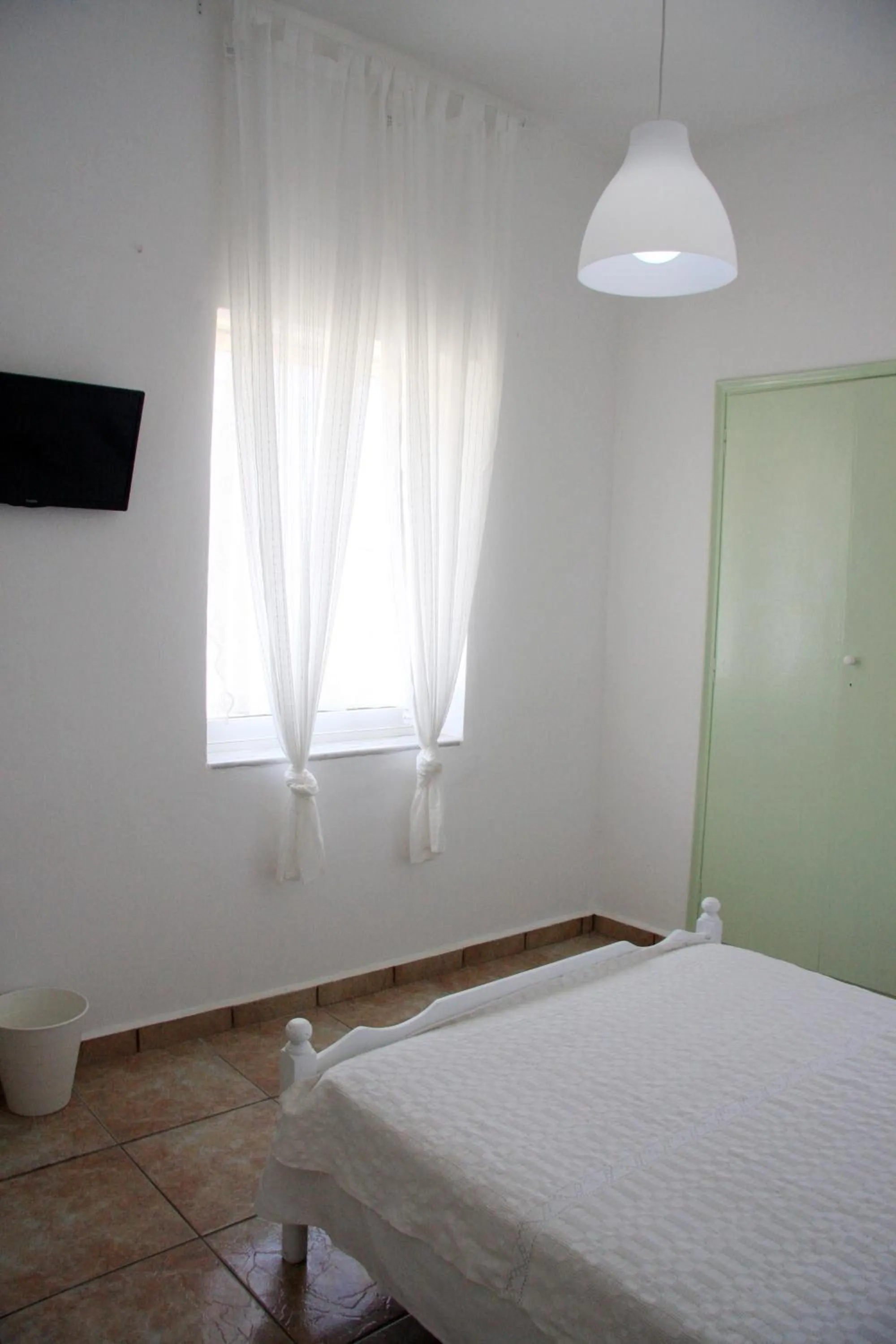 Photo of the whole room, Bed in Armadoros Hotel / Ios Backpackers