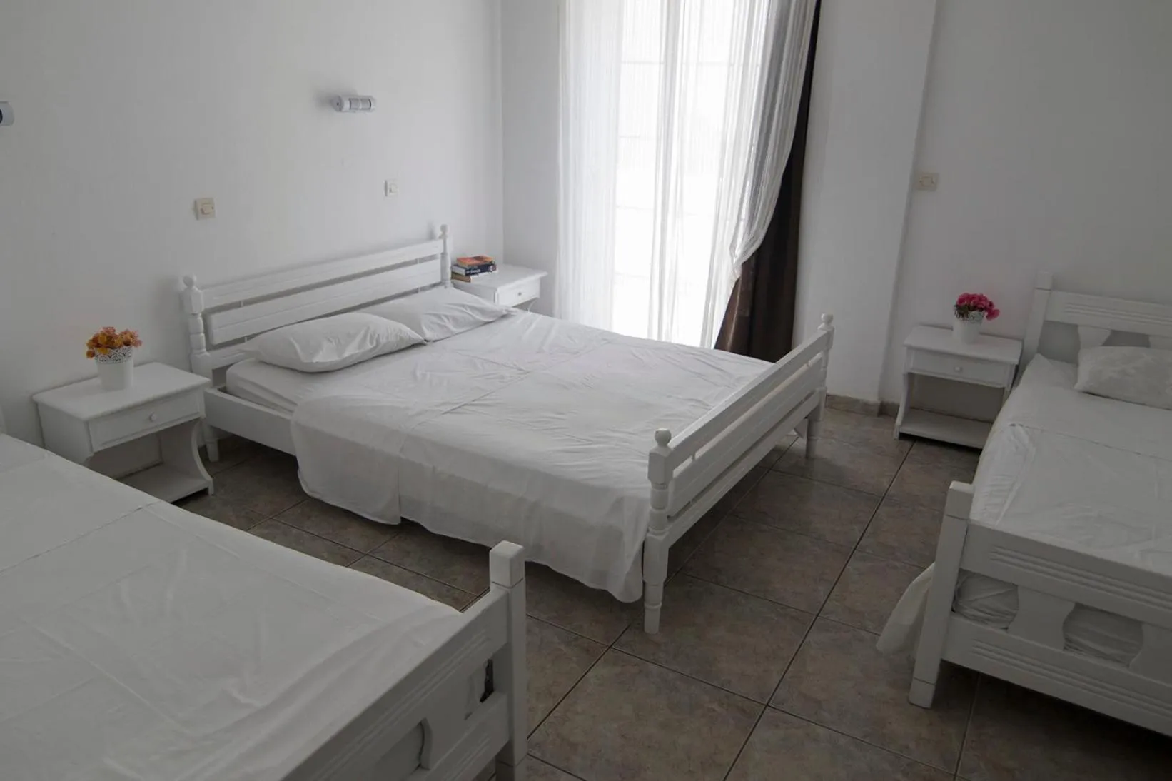 Photo of the whole room, Bed in Armadoros Hotel / Ios Backpackers