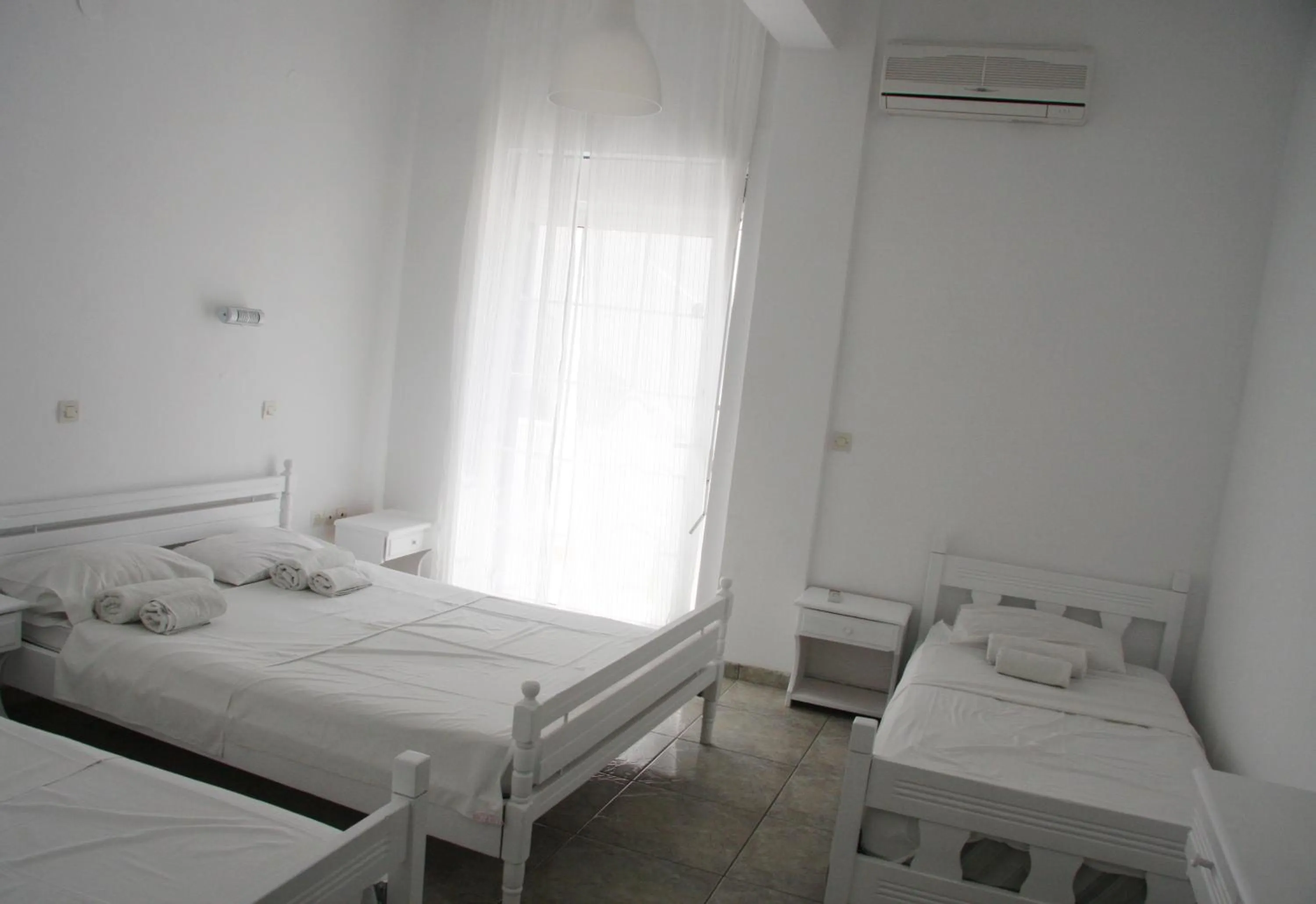 Photo of the whole room, Bed in Armadoros Hotel / Ios Backpackers