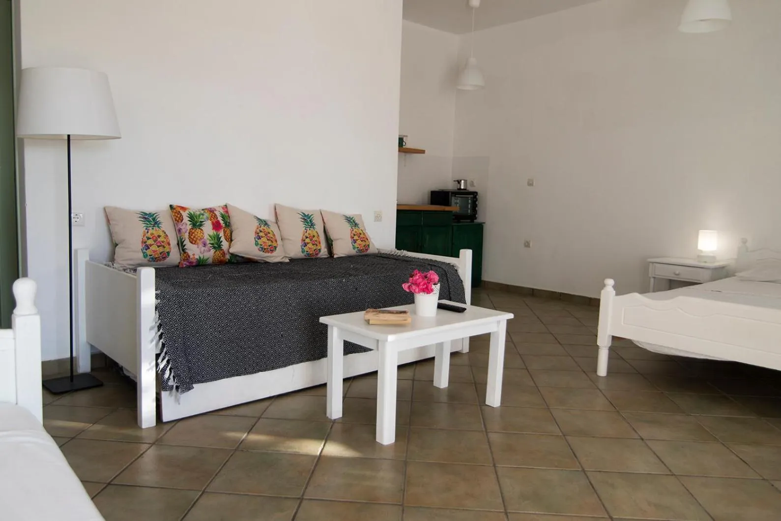 Kitchen or kitchenette, Bed in Armadoros Hotel / Ios Backpackers