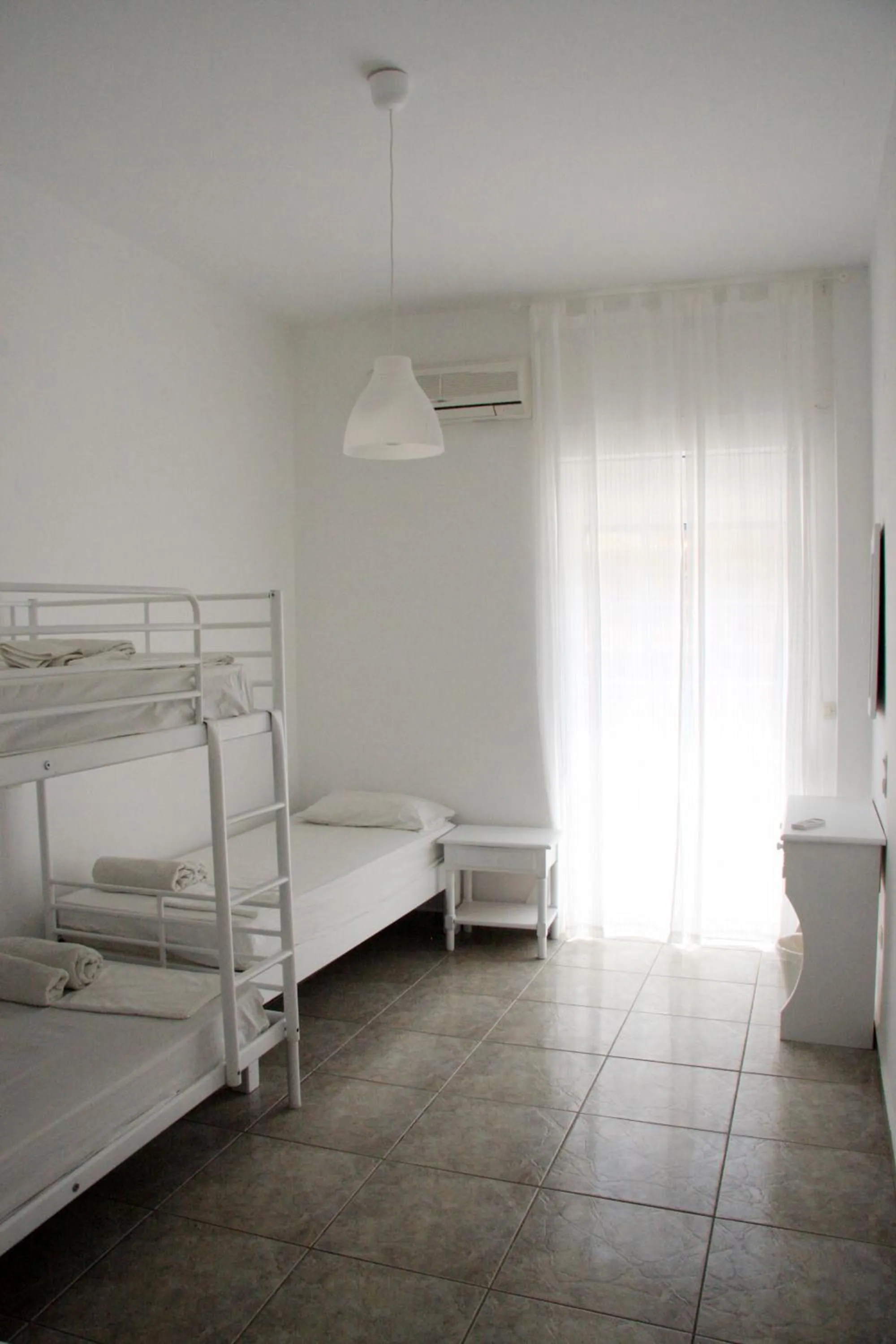 Photo of the whole room, Bed in Armadoros Hotel / Ios Backpackers