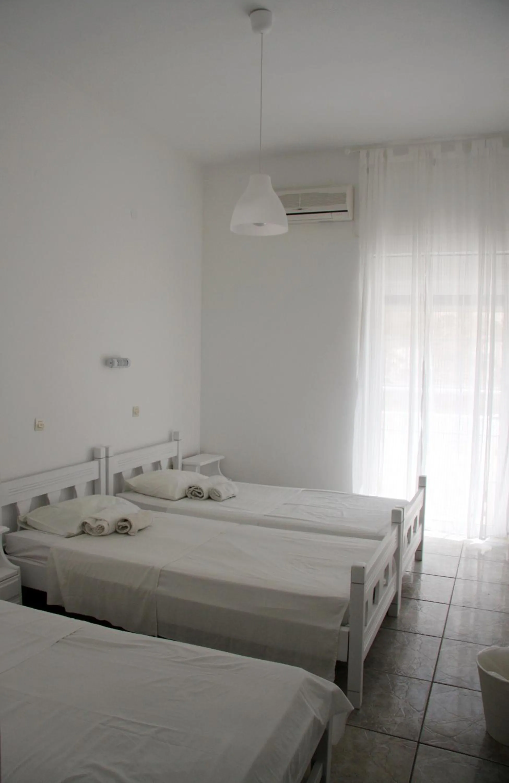 Photo of the whole room, Bed in Armadoros Hotel / Ios Backpackers