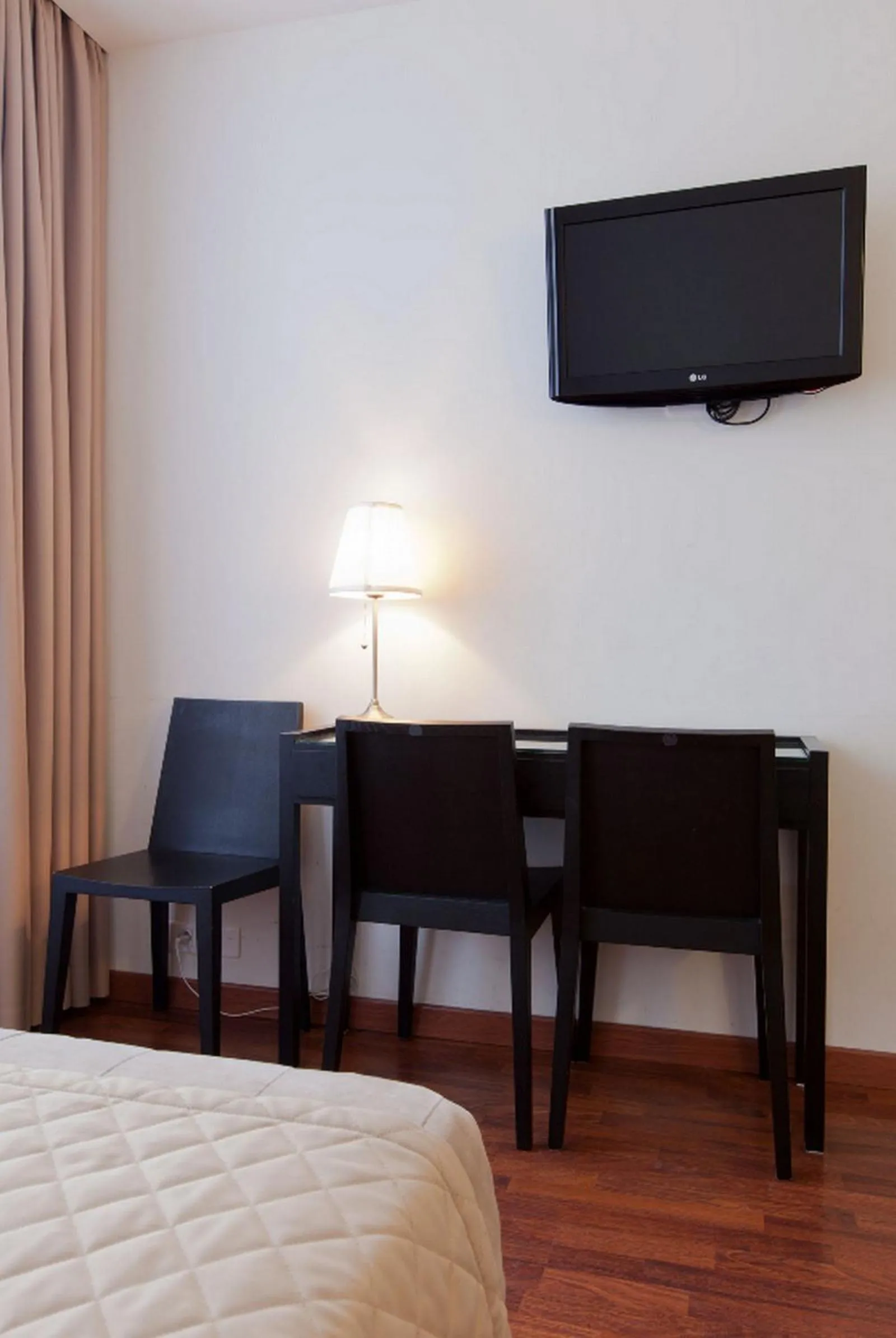 Bed in Cosmotel Hotel