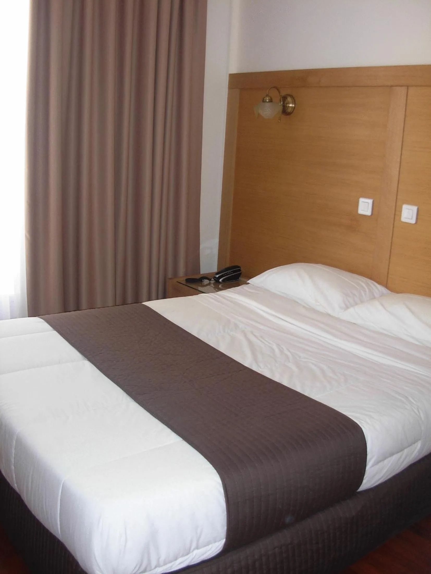 Photo of the whole room, Bed in Cosmotel Hotel