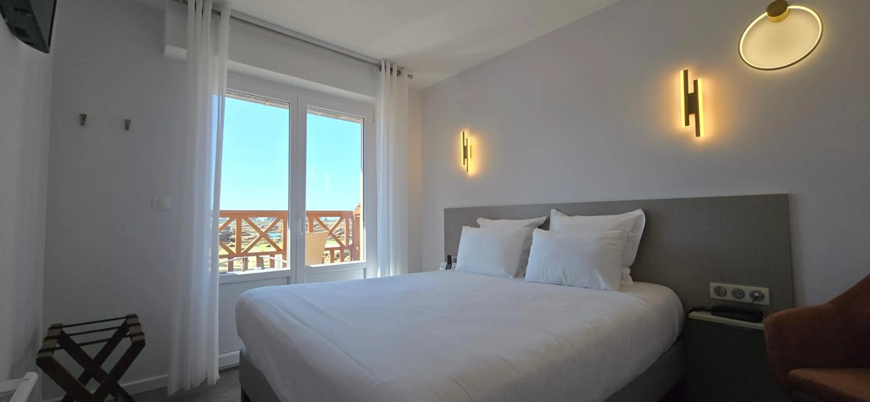 Photo of the whole room, Bed in Logis Hôtel Saint Guirec Et De La Plage