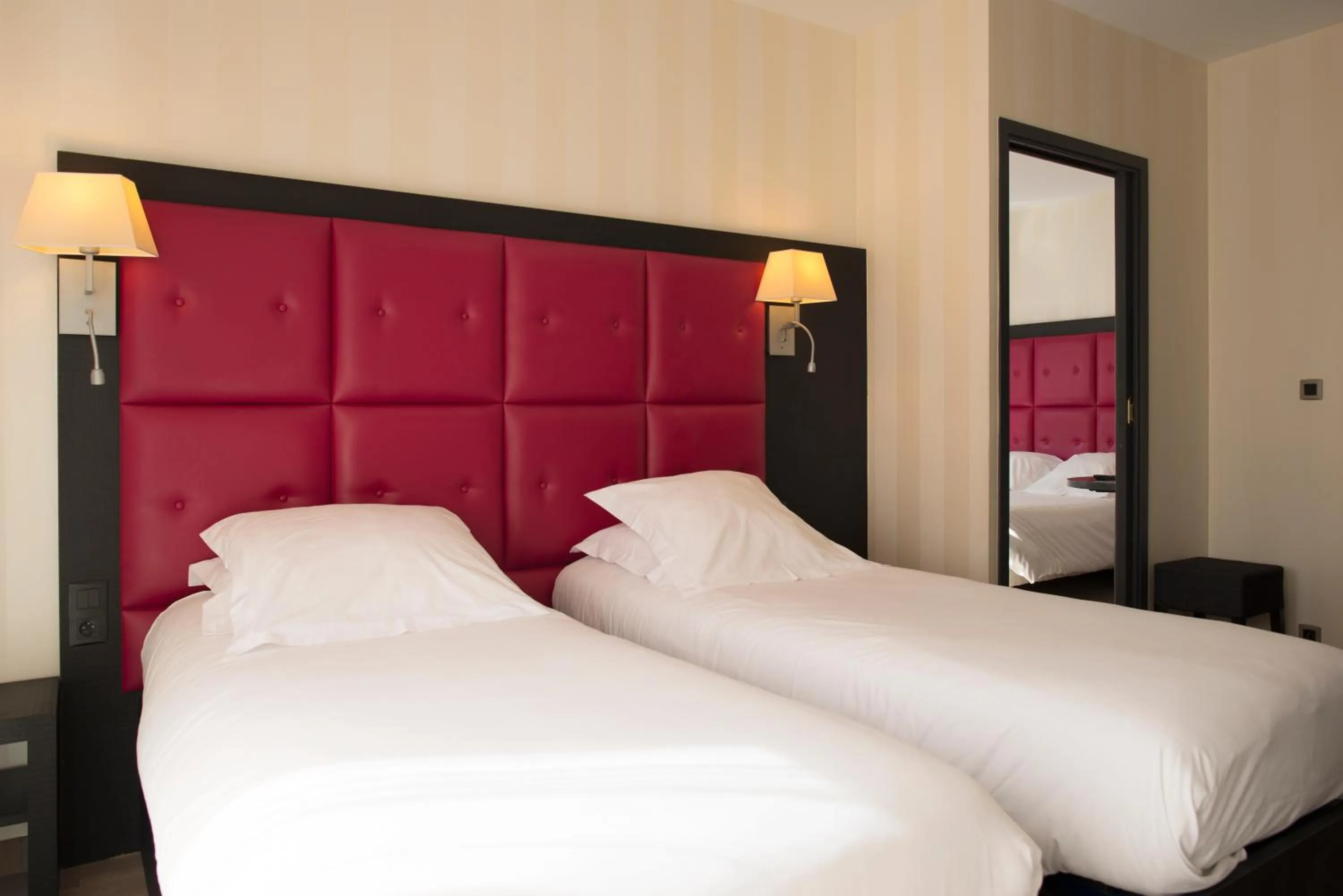 Photo of the whole room, Bed in Logis Hôtel Saint Guirec Et De La Plage