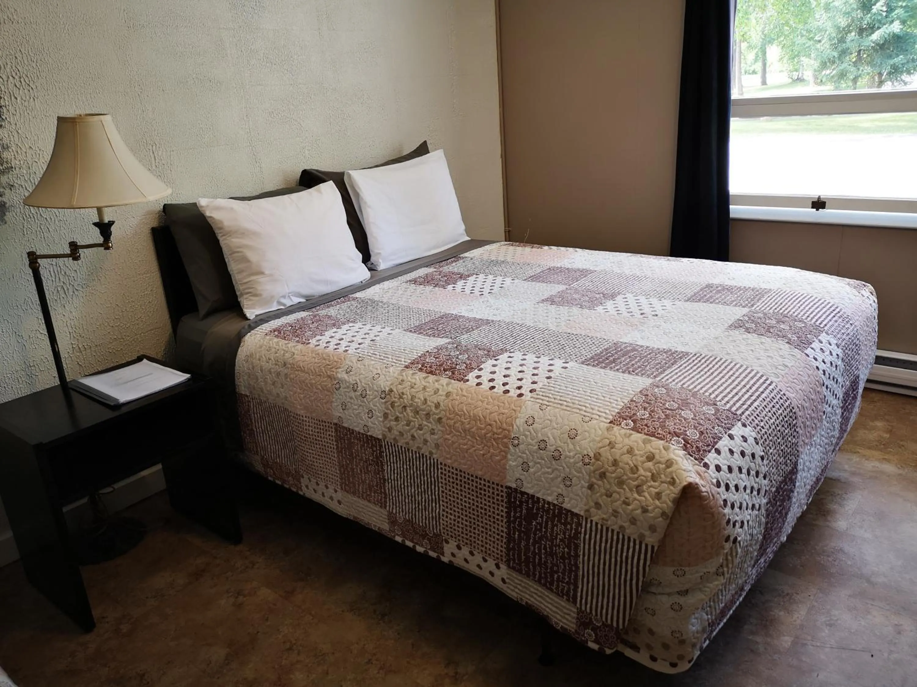 Bed in Overlook Inn & Cabins