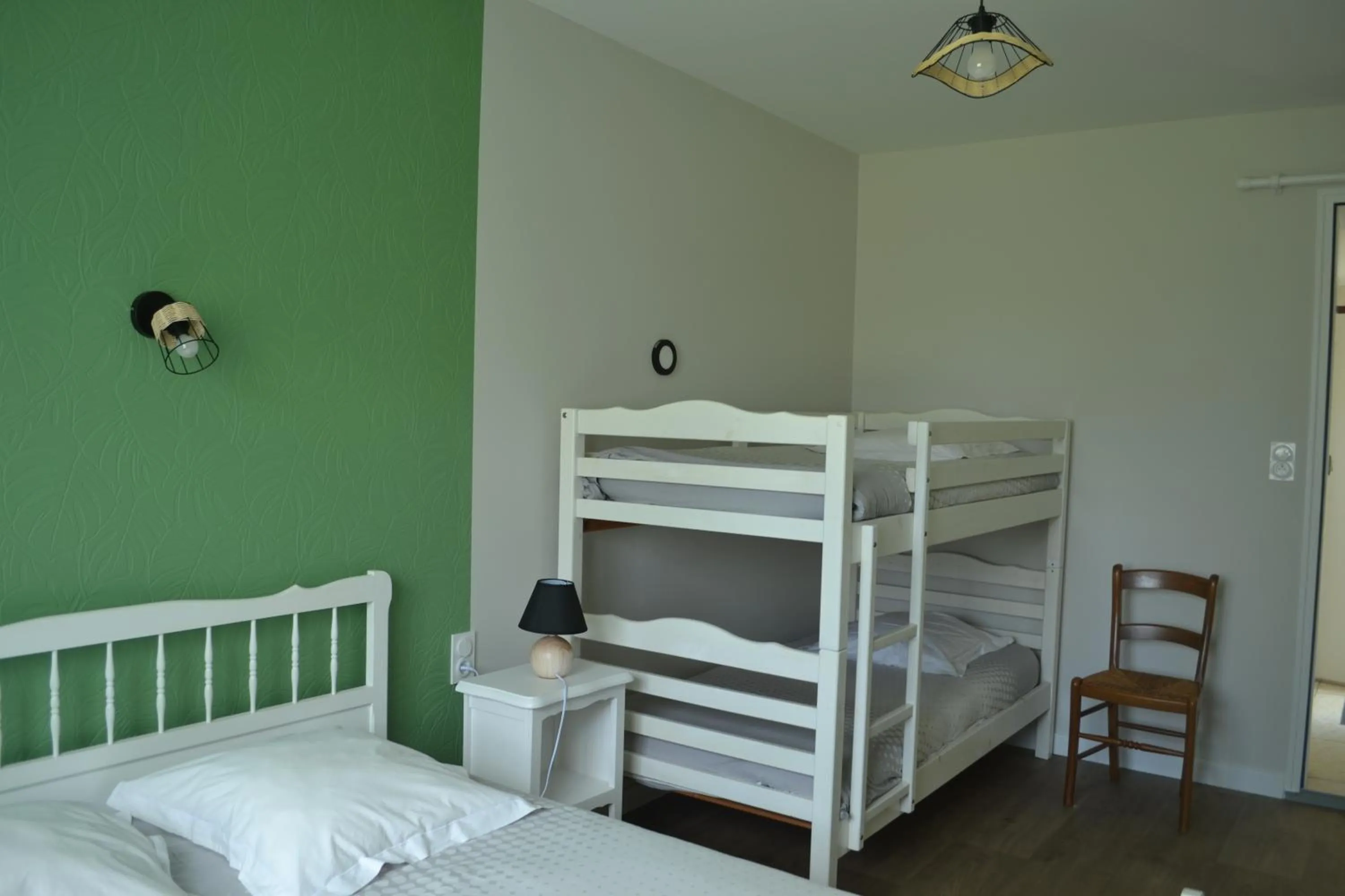 Bed in Chambre d'hôtes la ville en bois