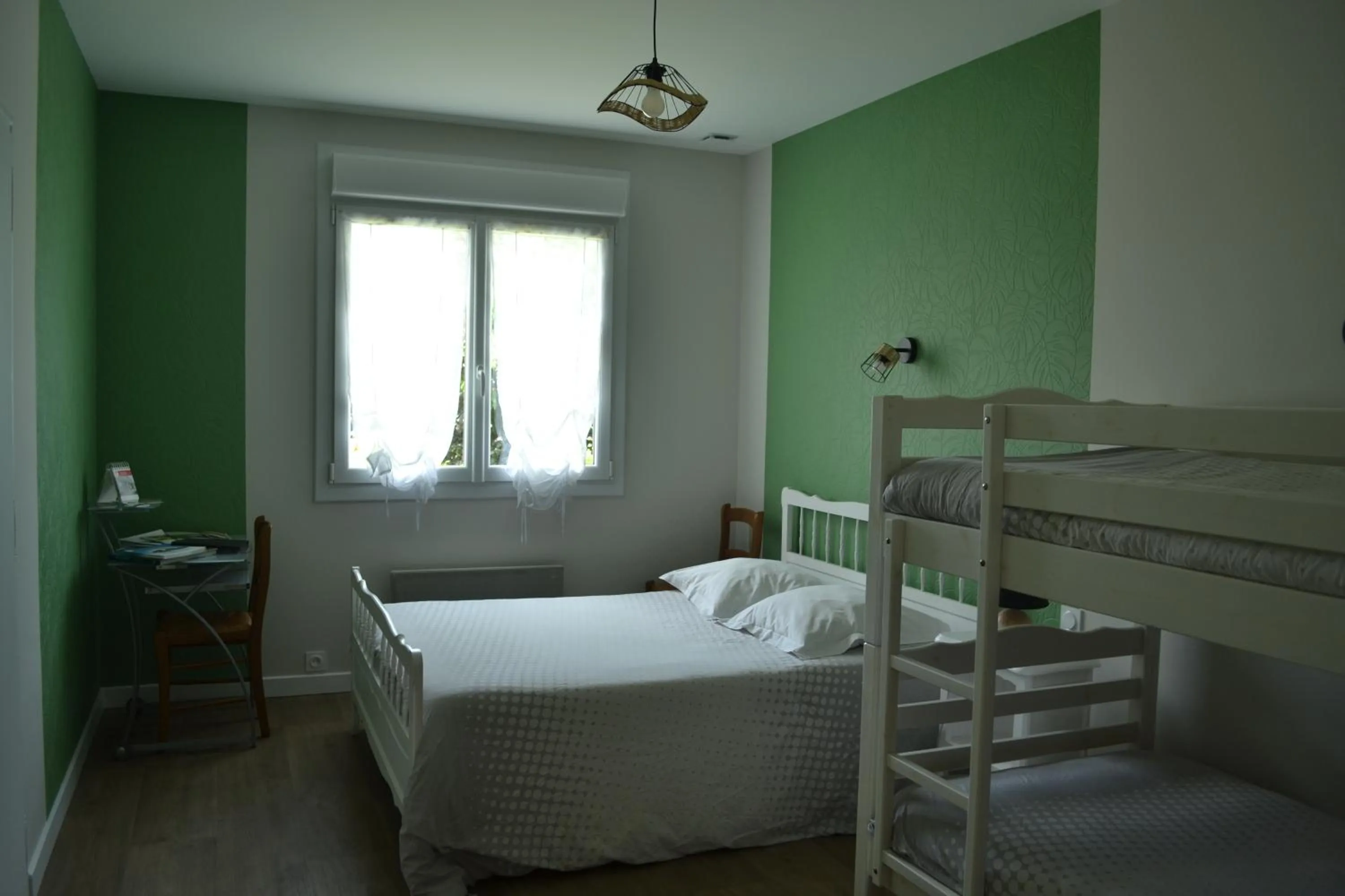 Bed in Chambre d'hôtes la ville en bois