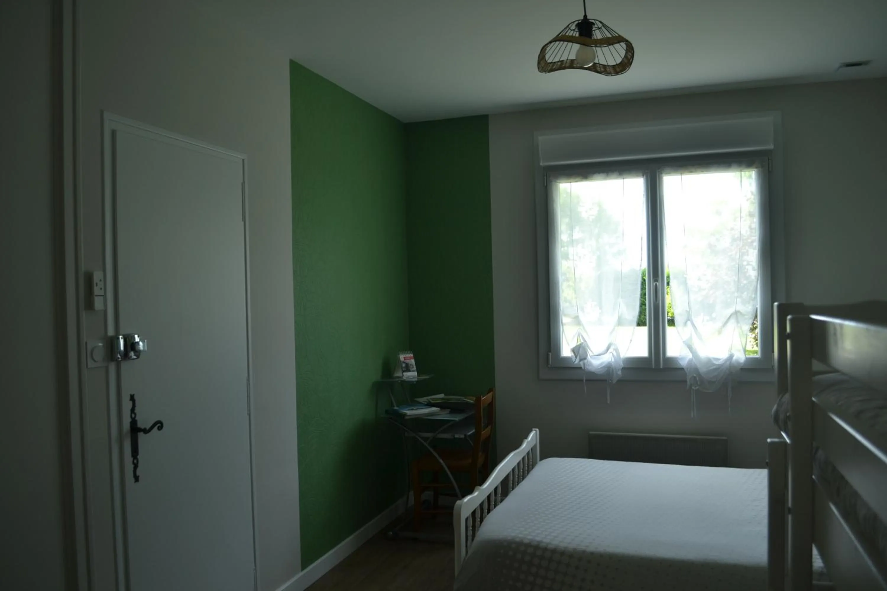 Bed in Chambre d'hôtes la ville en bois