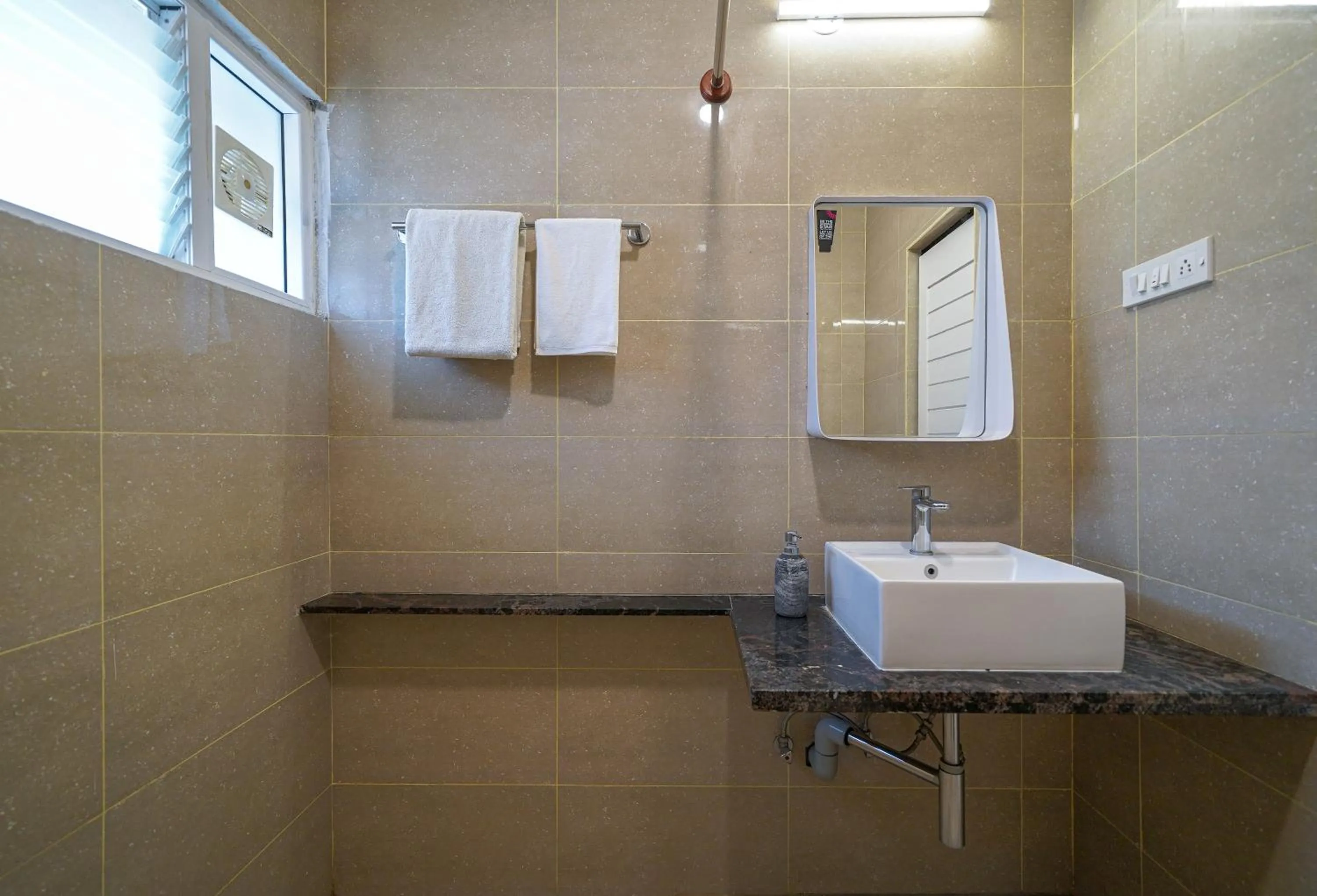 Bathroom in Olive Zip Indiranagar Metro by Embassy Group