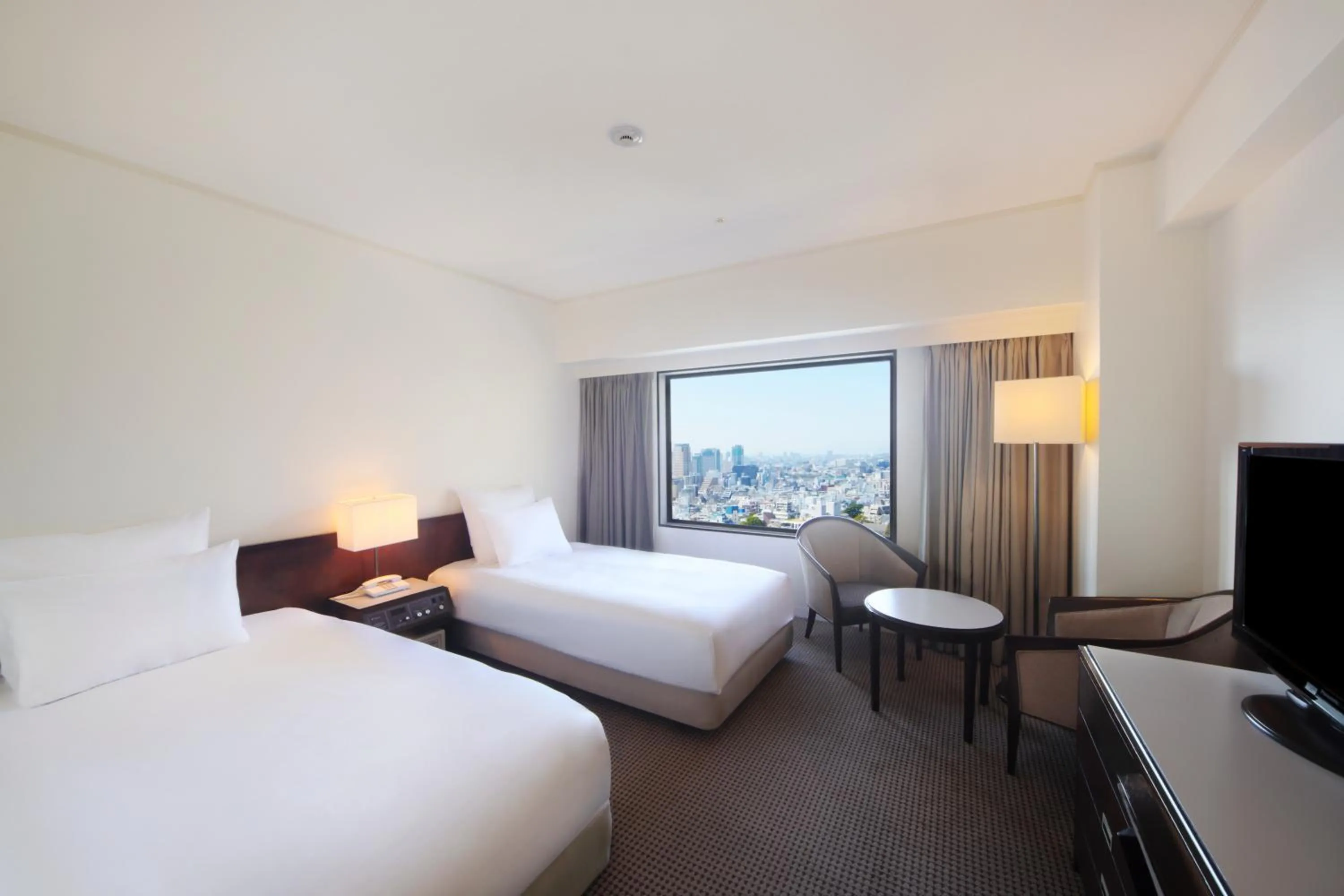 Bed in ANA Crowne Plaza Kobe by IHG