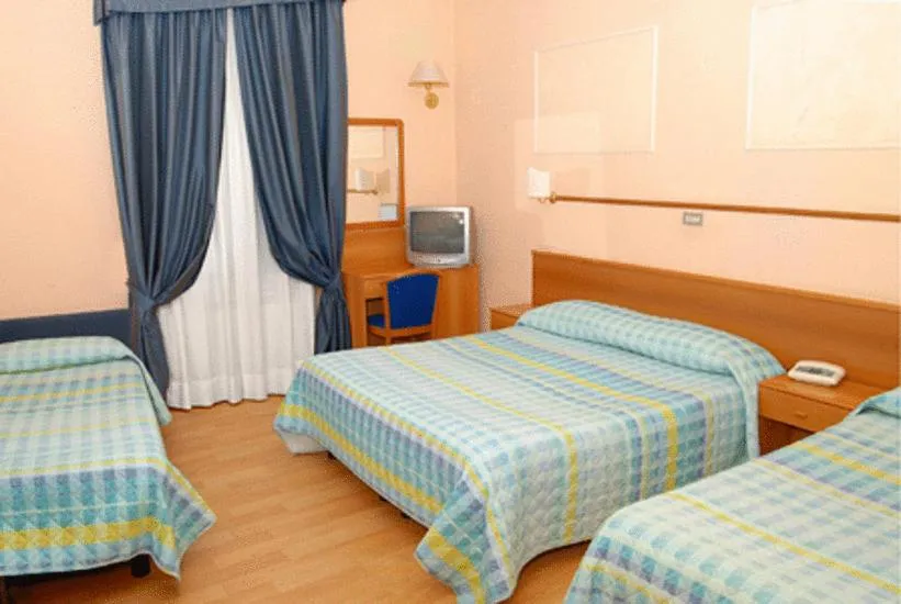 Photo of the whole room, Bed in Hotel Porziuncola