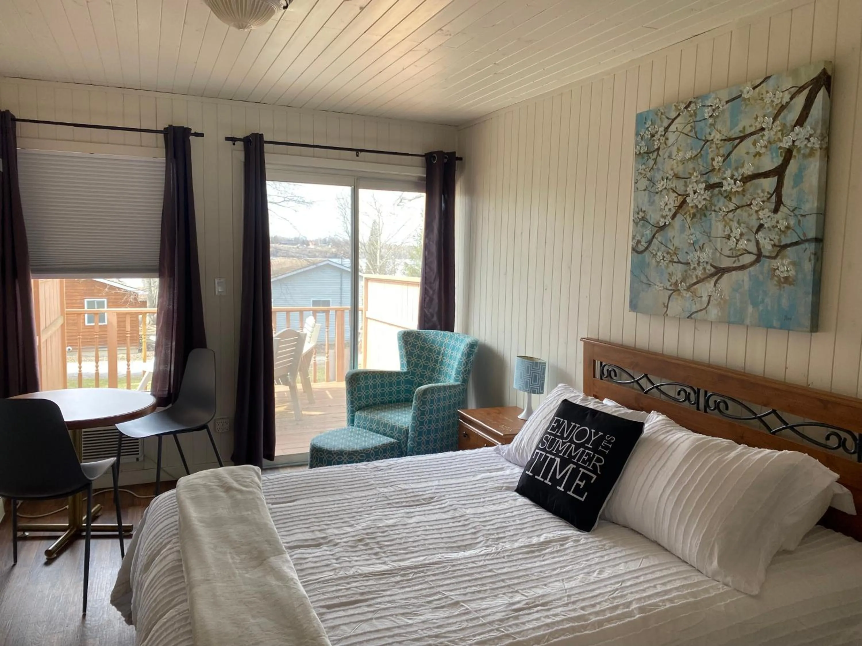 Bed in Merland Park Cottages and Motel