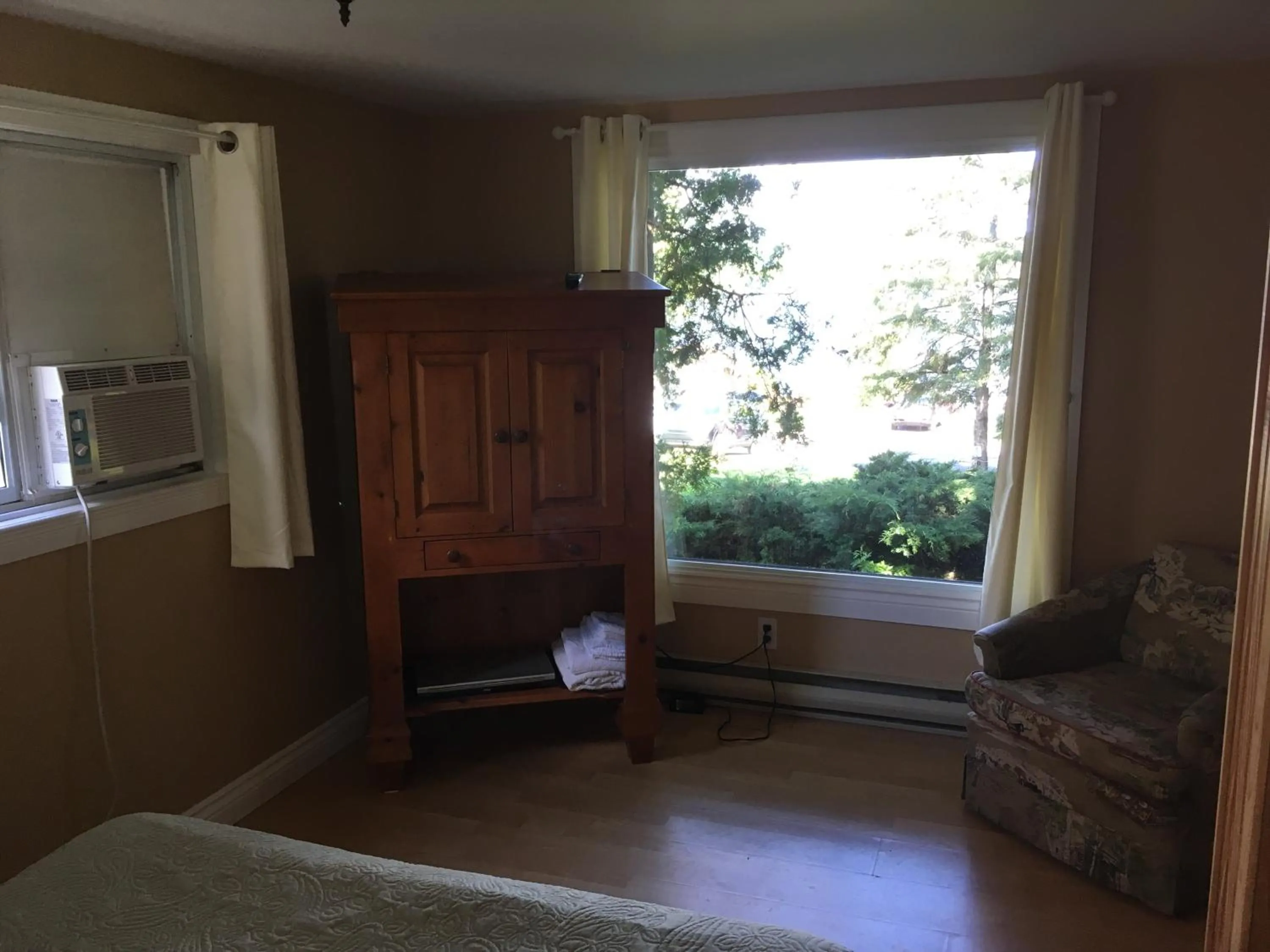 Bedroom in Merland Park Cottages and Motel