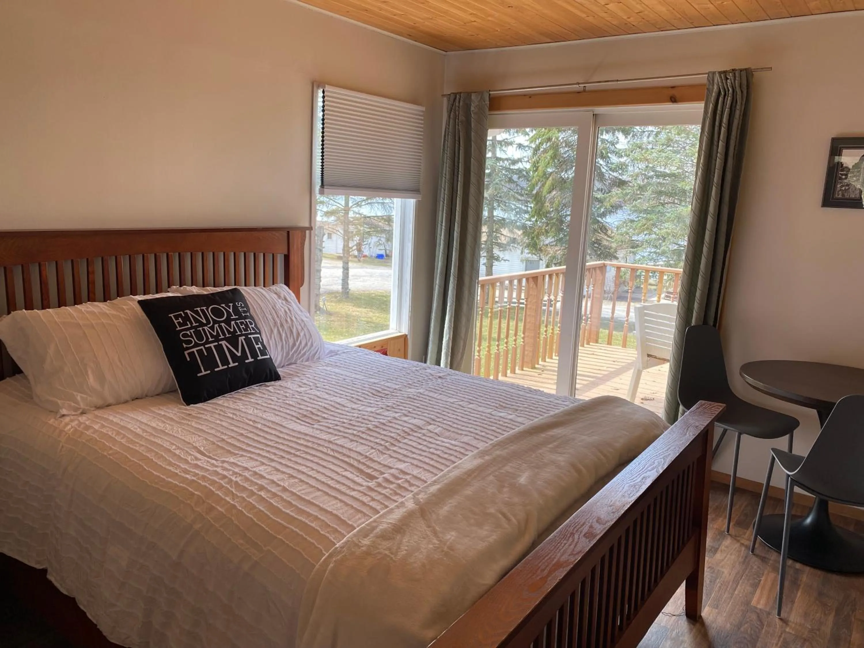 Bed in Merland Park Cottages and Motel