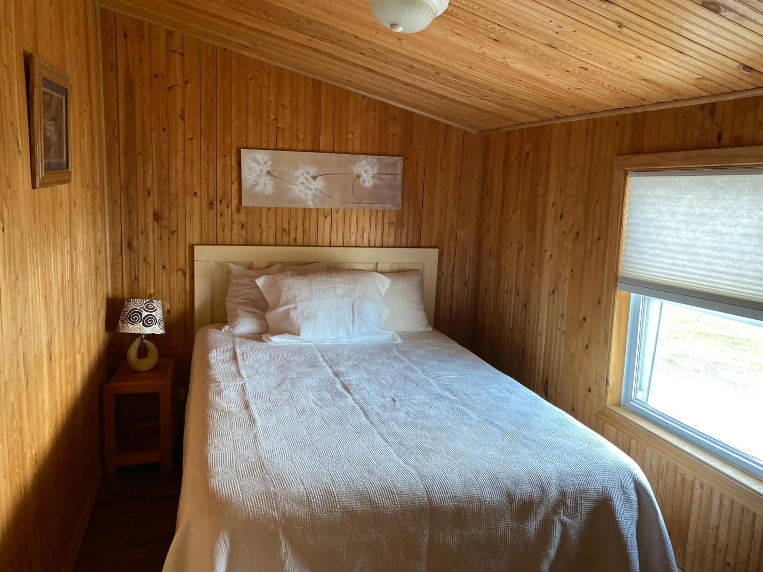 Bed in Merland Park Cottages and Motel