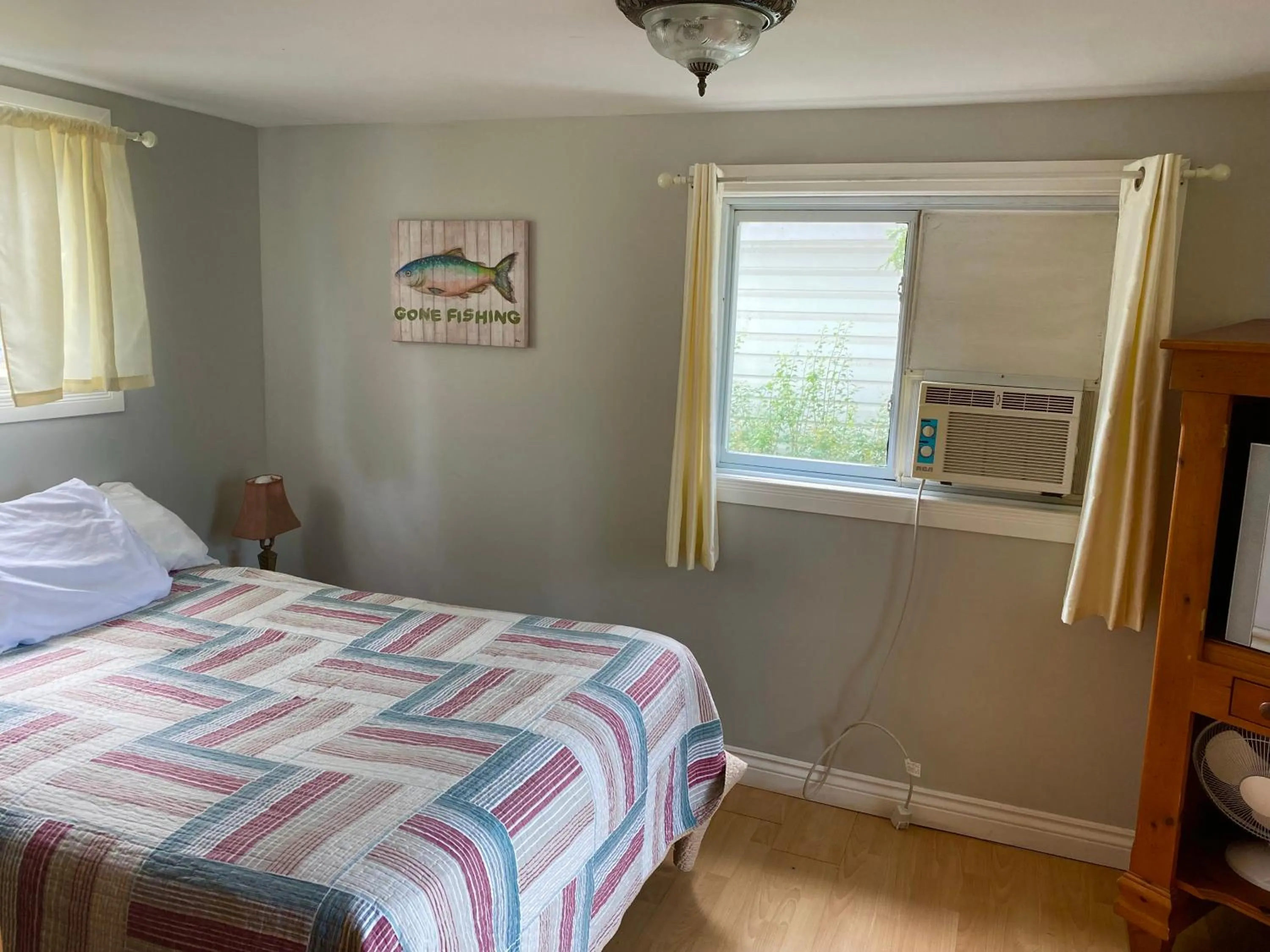 Bed in Merland Park Cottages and Motel