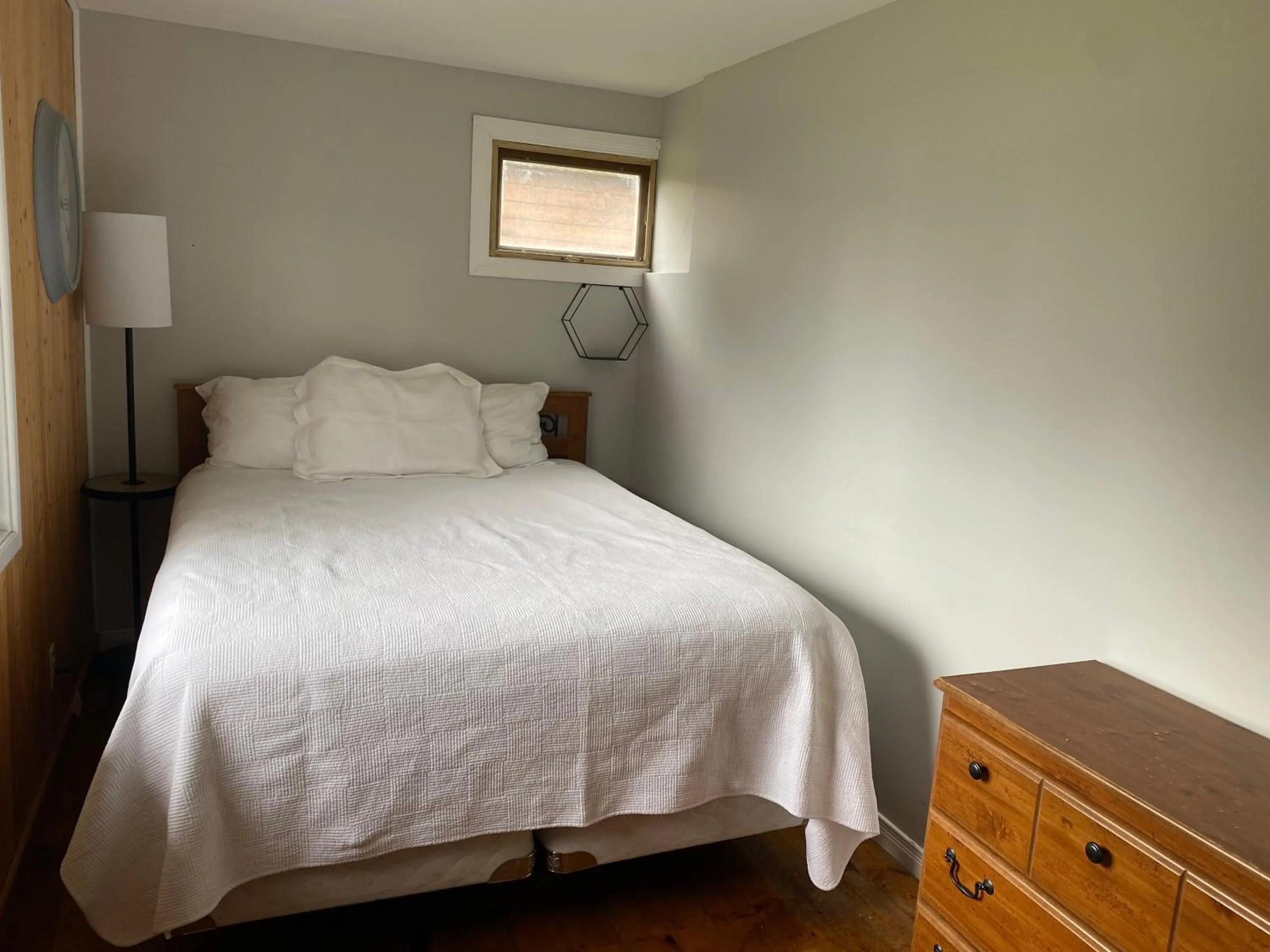 Bed in Merland Park Cottages and Motel