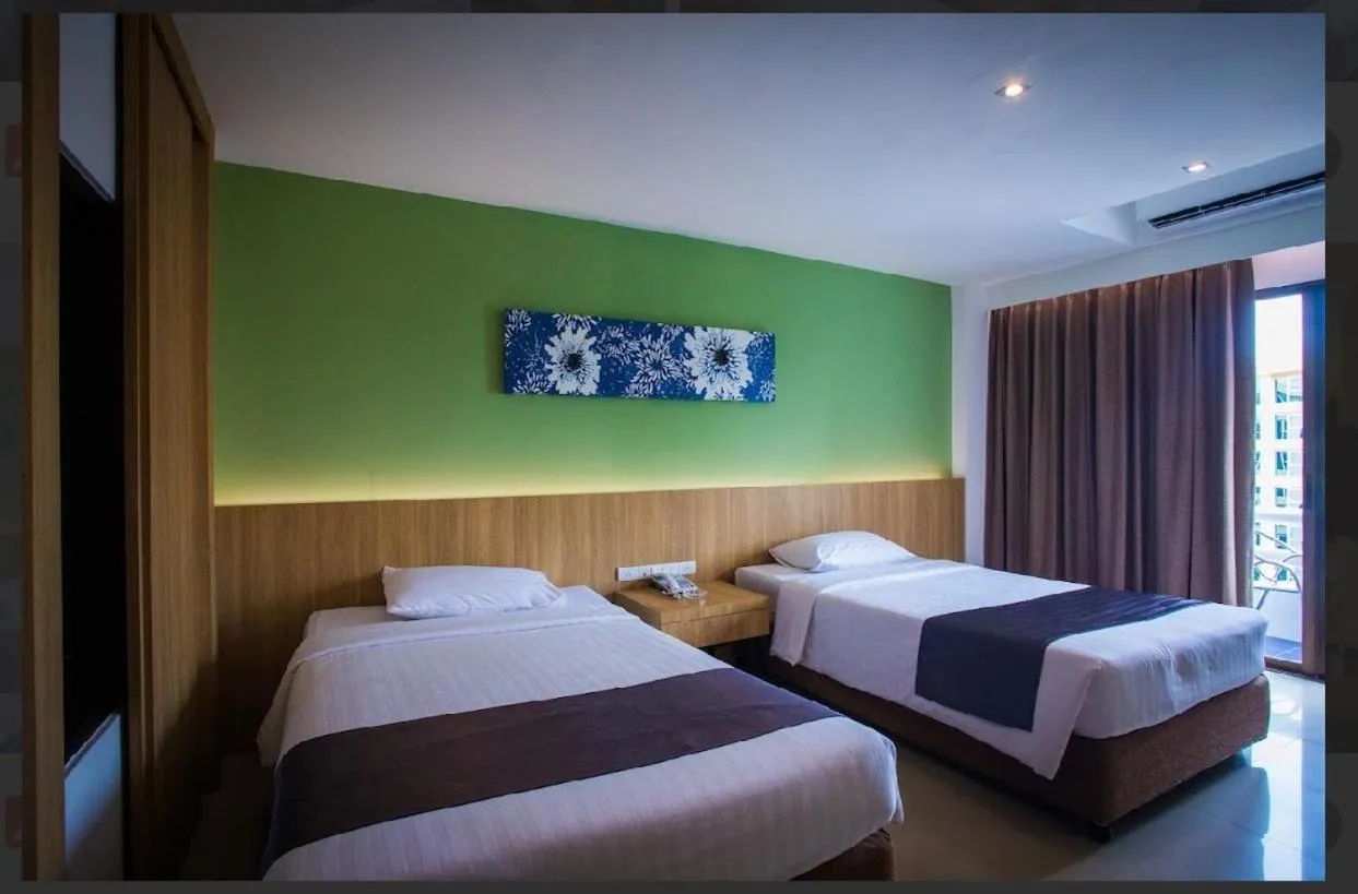 Bed in Royal Palace Hotel