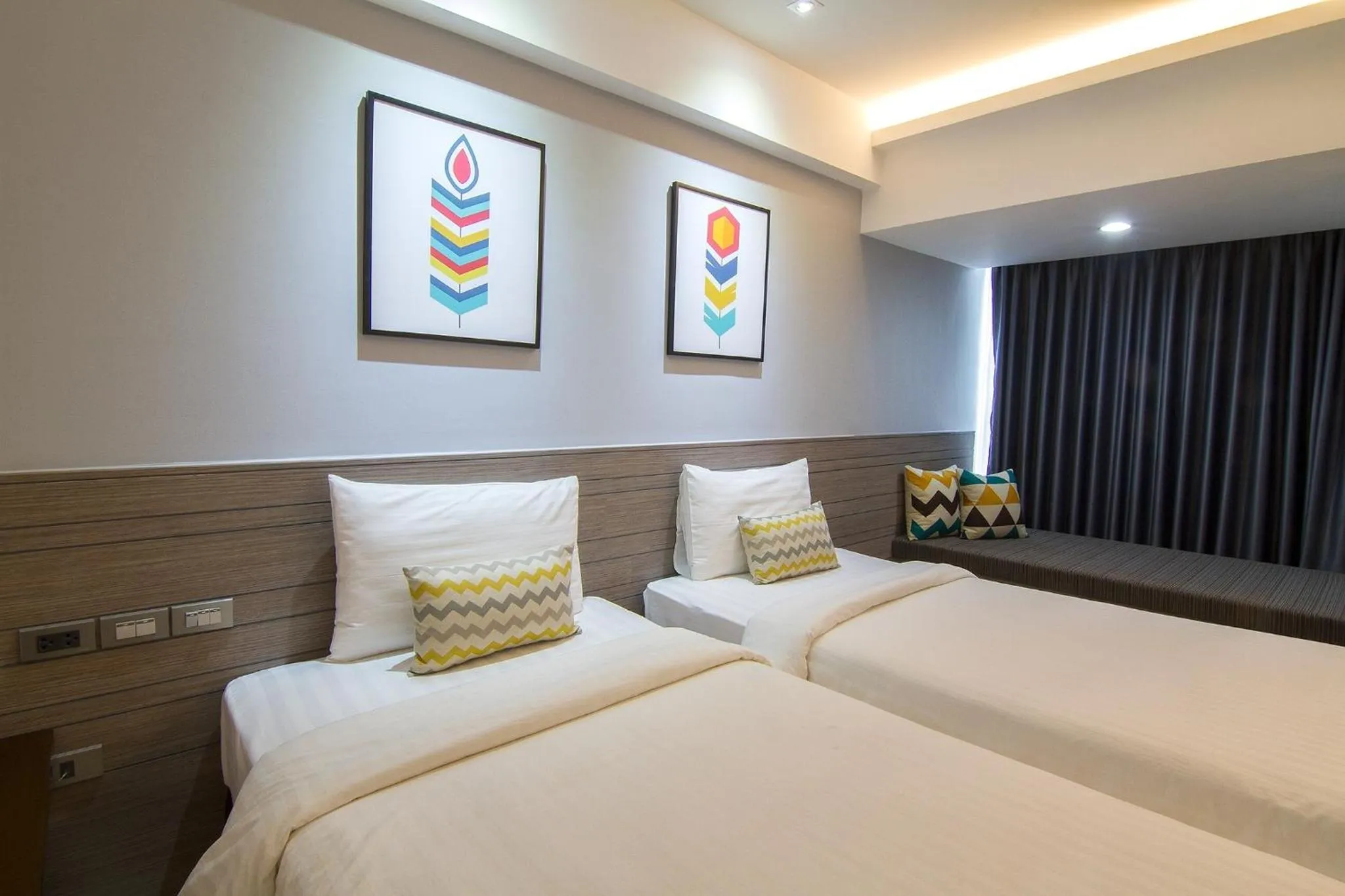 Bed in Bossotel Chiang Mai