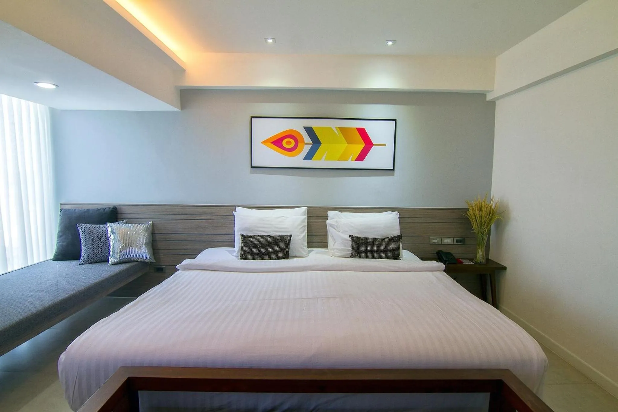 Bed in Bossotel Chiang Mai