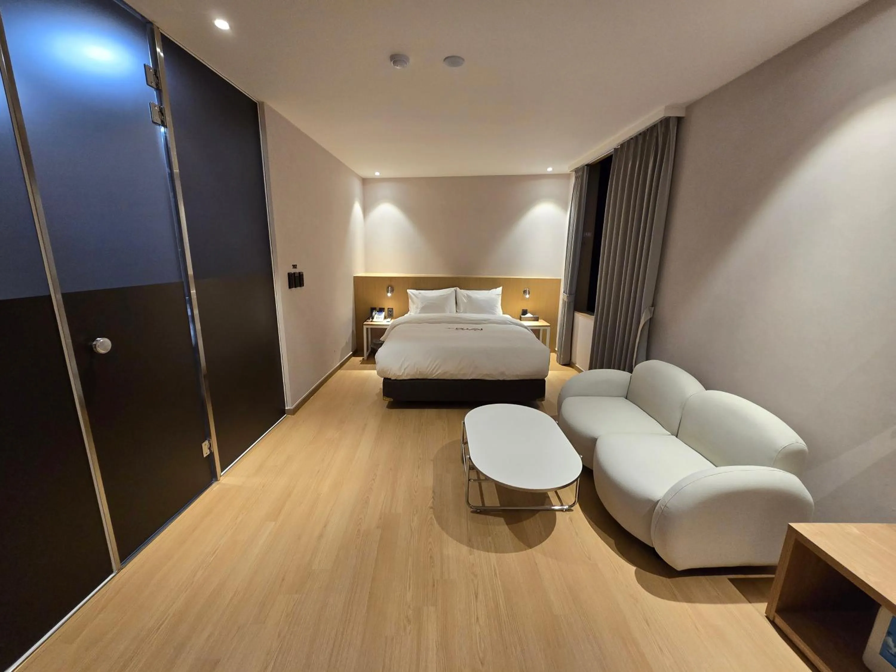 Bed in Tria Business & Boutique Hotel