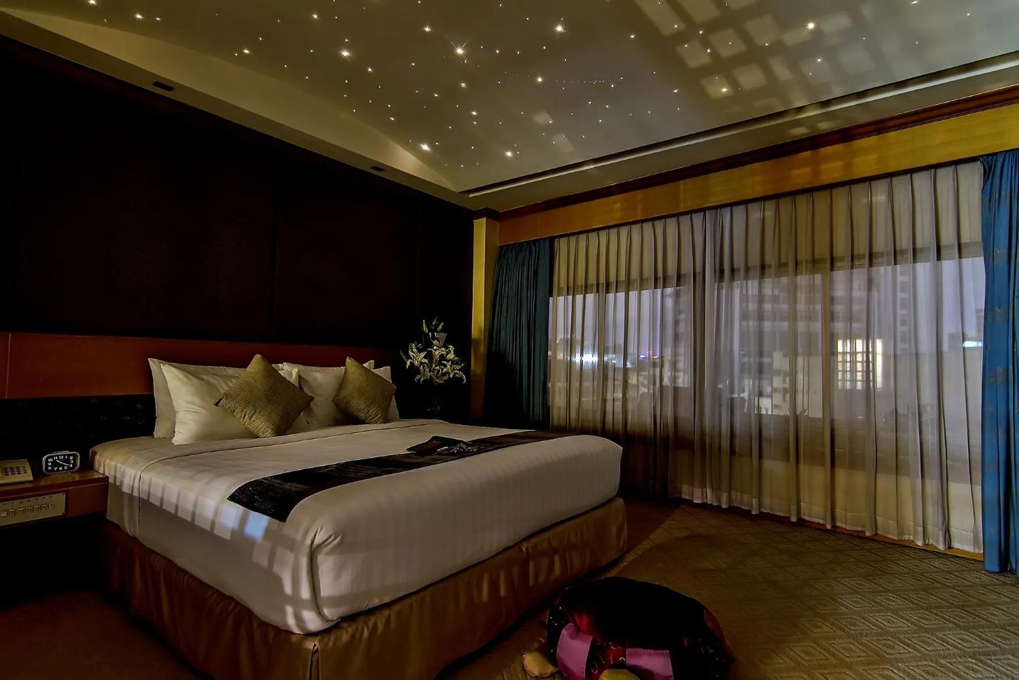 Bed in Bossotel Bangkok