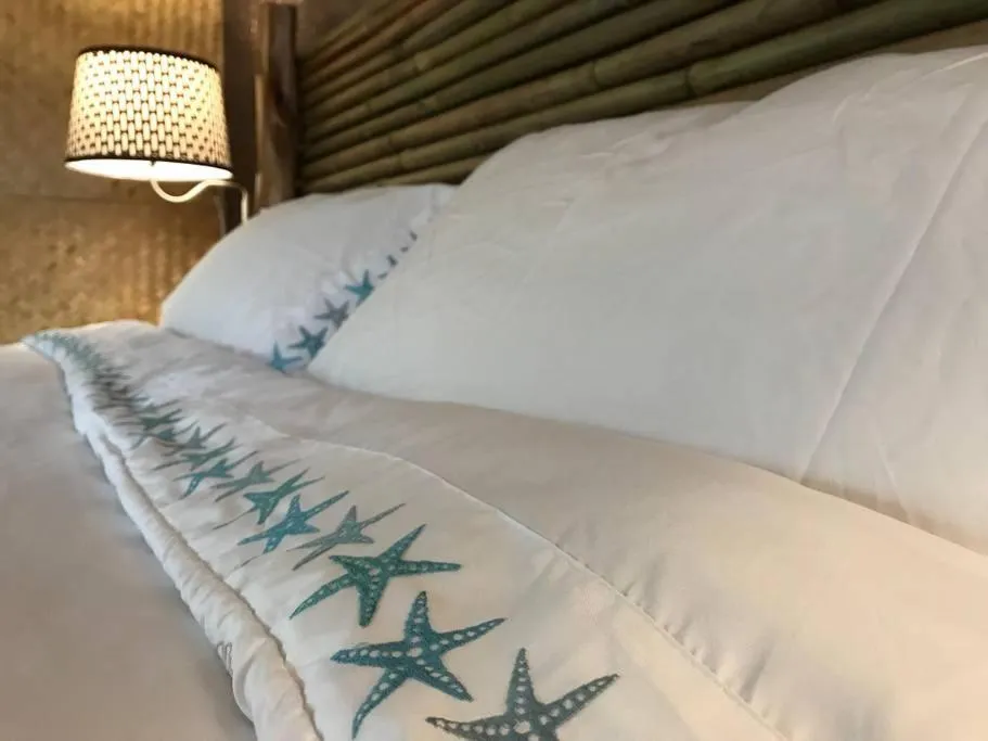 Bed in Volcano Eco Cabin & Eco Lodge