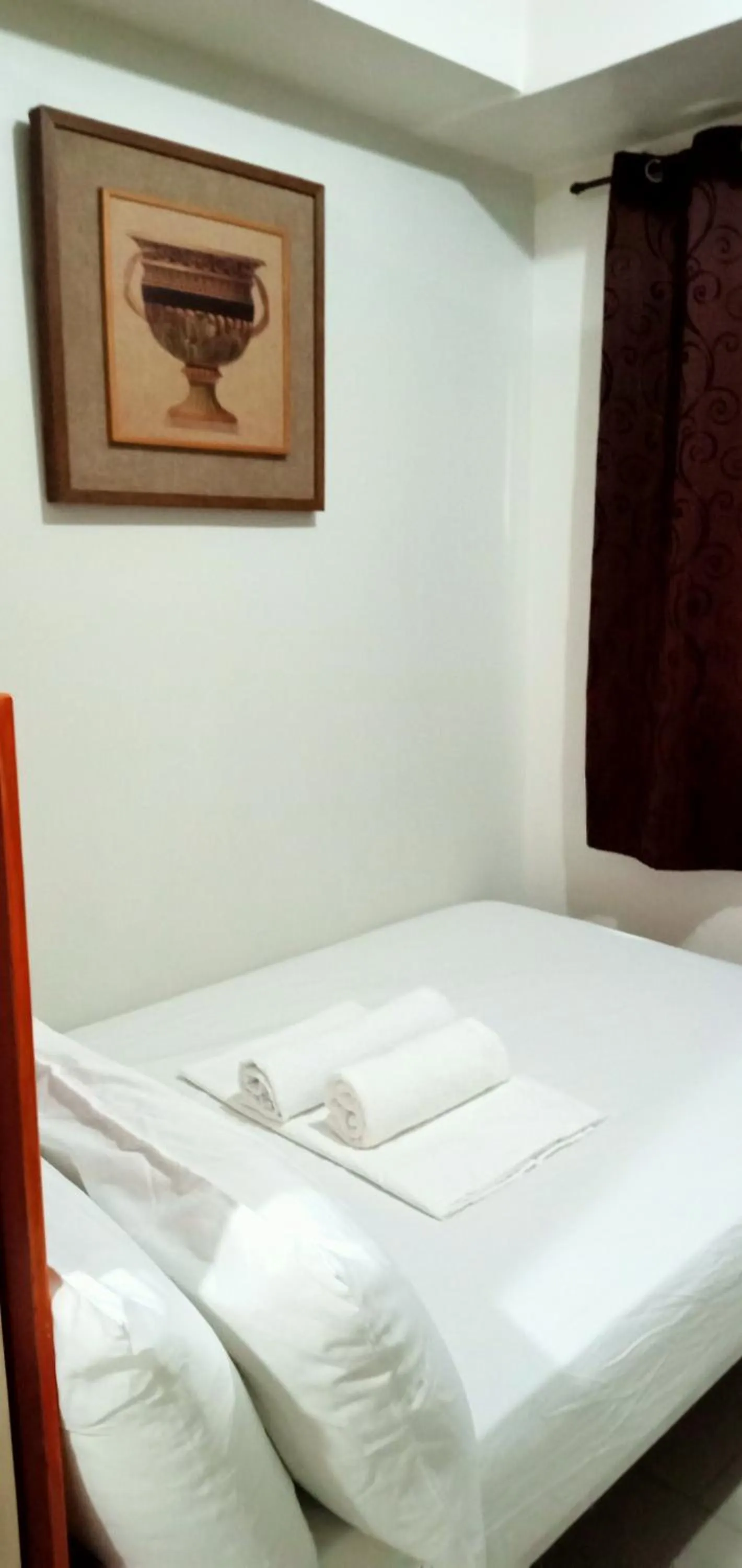 Bed in Chin's Place Sea Residences MOA